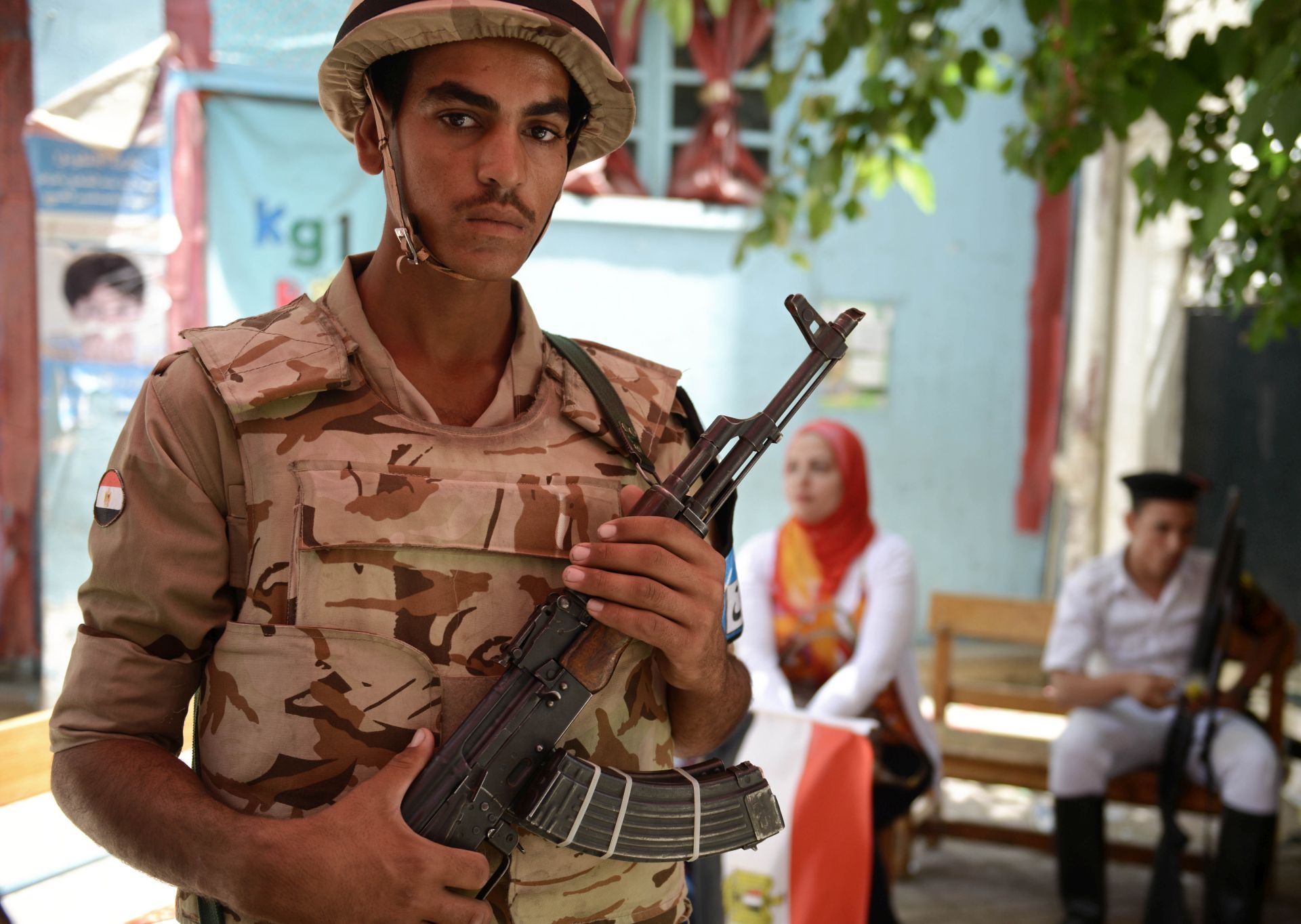 CAIRO, EGYPT - MAY 26:  An Egyptian military conscript stands outside a polling station in the Garden City suburb of Cairo on the first day of presidential elections on May 26, 2014 in Cairo, Egypt. Egypt will hold Presidential elections on 26th and 27th May for the first time since the military deposed President Morsi. There are only two candidates standing, Hamdeen Sabahi and Abdel Fattah al-Sisi with al- Sisi expected to win the election (Photo by Jonathan Rashad/Getty Images)