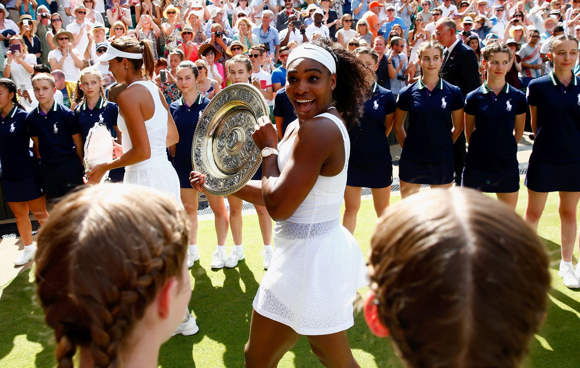LONDON, ENGLAND - JULY 11:  Serena Williams of the United States leaves court with the Venus Rosewater Dish after her victory in the Final Of The Ladies' Singles against Garbine Muguruza of Spain during day twelve of the Wimbledon Lawn Tennis Championships at the All England Lawn Tennis and Croquet Club on July 11, 2015 in London, England.  (Photo by 