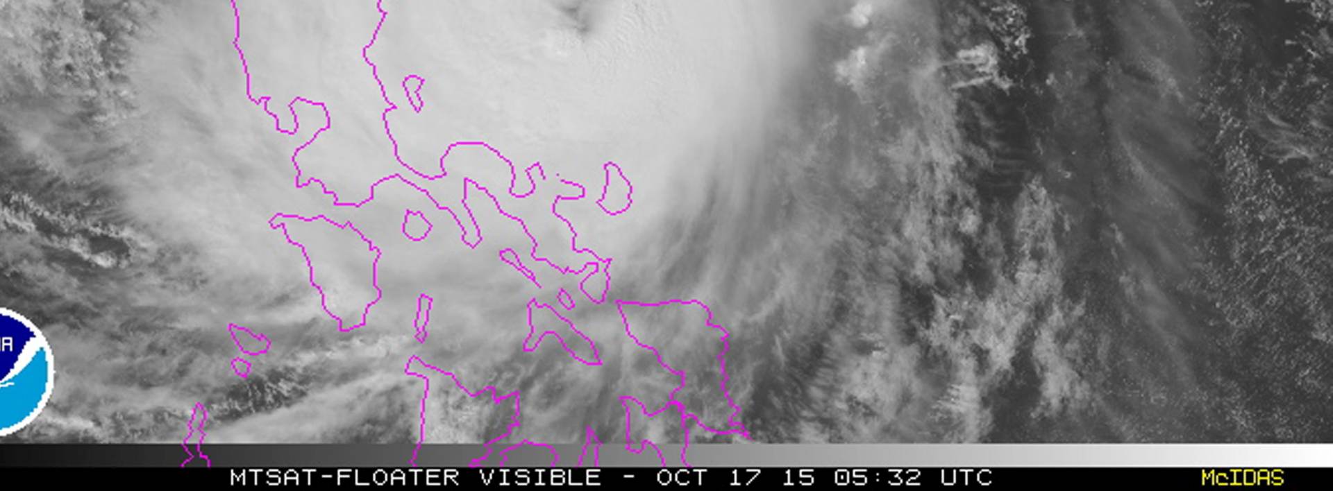 epa04980574 A handout photo made available on the website of the National Oceanic and Atmospheric Administration (NOAA) on 17 October 2015 shows a satellite image of the visible floater of typhoon Koppu as it advances the coastline (L) of the Philippines on 17 October 2015. Typhoon Koppu strengthened as it swirled closer to the Philippines 17 October, dumping heavy rains over a wide area in the country's north-eastern coast, the weather bureau said. More than two dozen domestic flights were cancelled, while boat travel had been suspended amid choppy seas. Storm signal warnings were raised for nearly 30 provinces, including Manila.  EPA/NOAA / HANDOUT  HANDOUT EDITORIAL USE ONLY