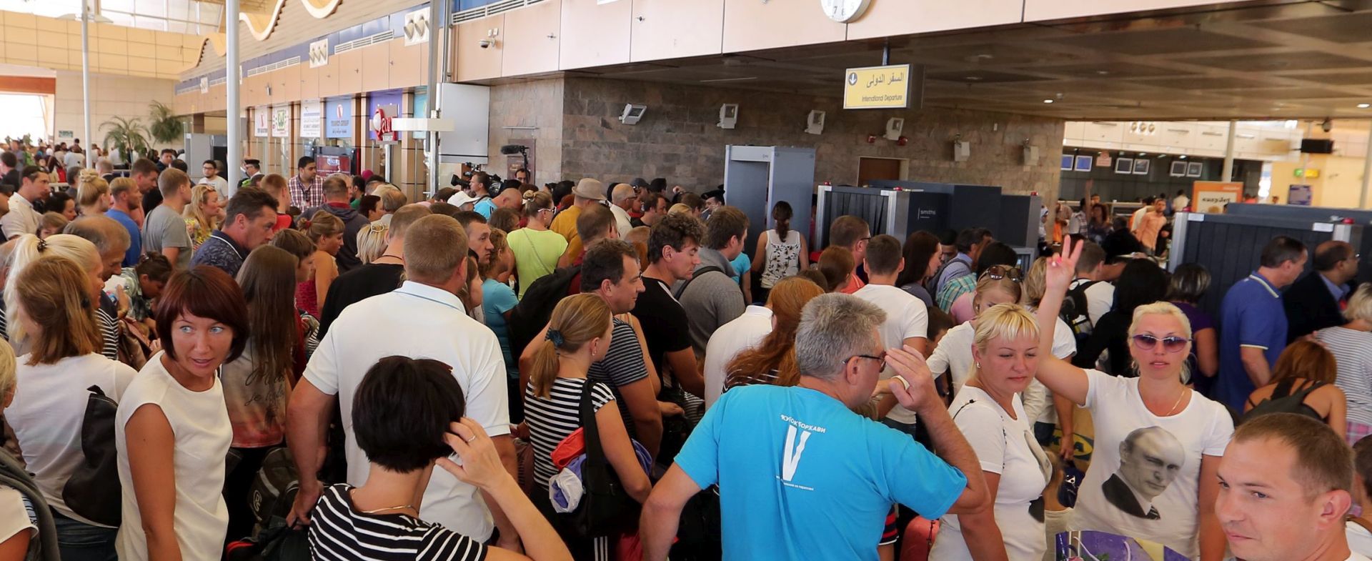 epa05013715 Tourists gather to check in at Sharm el-Sheikh airport, in Sharm el-Sheikh, Egypt, 06 November 2015. Airlines will begin flying stranded British tourists home 06 November after the government in London permitted flights from Egypt's Sharm el-Sheikh resort to resume. Earlier, British Prime Minister David Cameron maintained that the crash of a Russian passenger jet, which killed 224 people in Egypt, was 'more likely than not' caused by a bomb, despite Russian and Egyptian leaders' calls for all sides to await results of an official investigation.  EPA/KHALED ELFIQI  EPA/KHALED ELFIQI