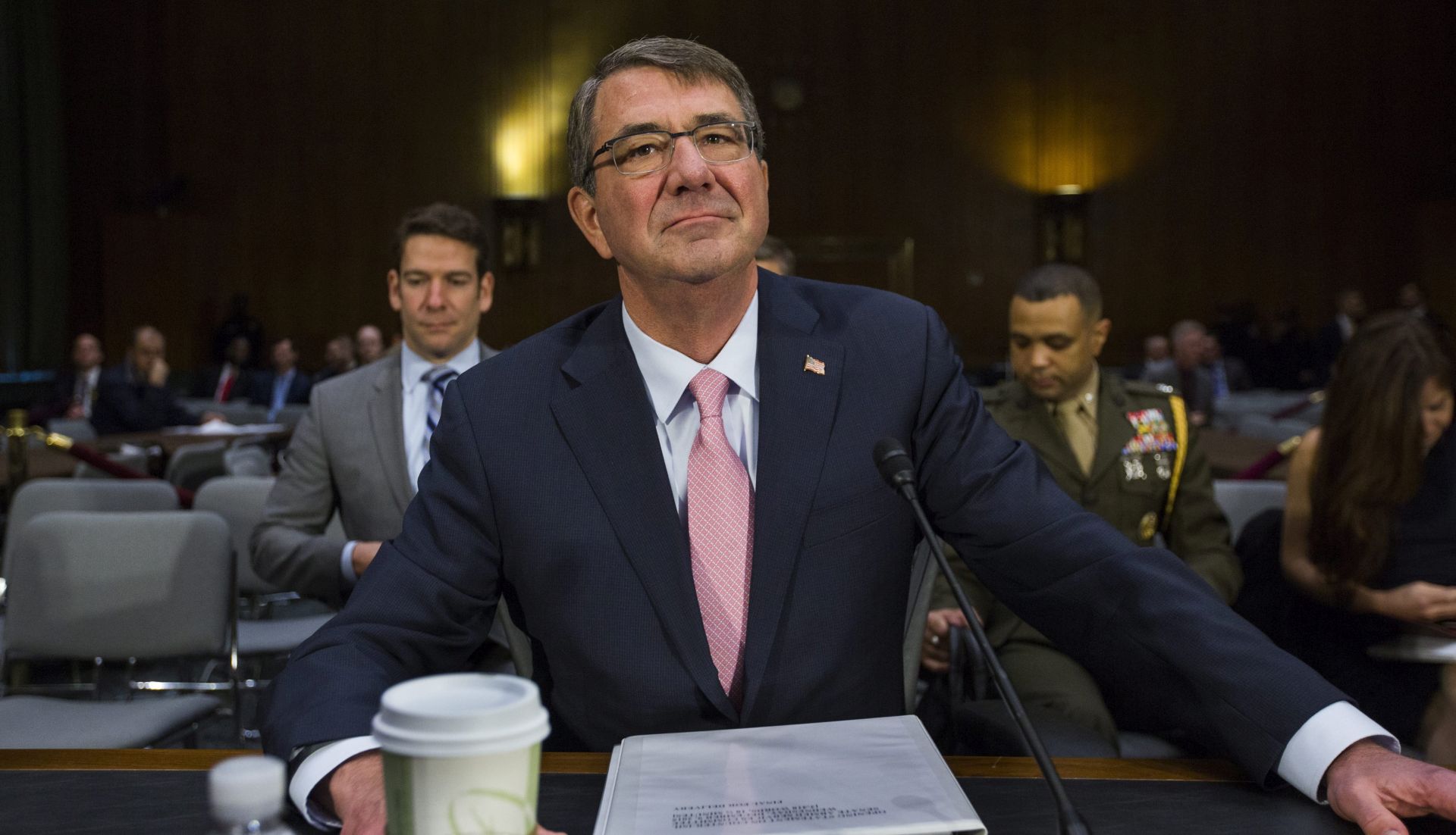 epa05061660 US Defense Secretary Ashton Carter prepares to testify at a Senate Armed Services Committee hearing on the Obama administration's strategy to counter the so-called Islamic State (ISIS) as well as US policy toward Iraq and Syria in the Dirksen Senate Office Building in Washington, DC, USA, 09 December 2015. The US will be sending Special Operations Forces into Syria to counter ISIS.  EPA/JIM LO SCALZO