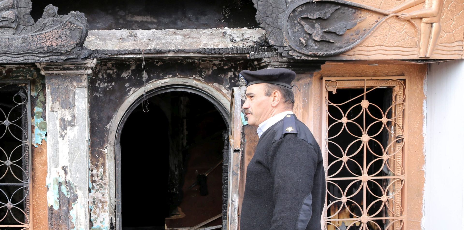 epa05053946 Members of the Egyptian security  stand guard in the restaurant that was attacked near Cairo, Egypt, 04 December 2015. At least 12 people were killed in an overnight attack on a restaurant near Cairo, reports say that attackers threw petrol bombs at the restaurant in the plush quarter of Agouza, sparking a fire in the place. An unspecified number of people were also reported injured in the attack, the motives of which were not immediately clear. Egypt has seen a surge in militant attacks, mainly against security forces, since the military's 2013 overthrow of Islamist president Mohammed Morsi.  EPA/KHALED ELFIQI