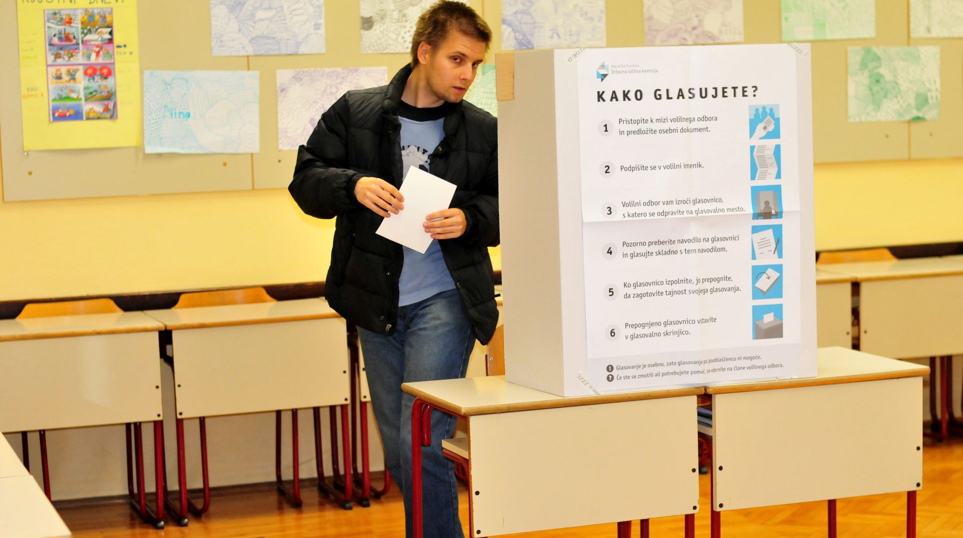 epa05076110 A man arraives to cast his ballot at a polling station in Ljubljana, Slovenia on 20 December 2015, during the referendum to repeal the law allowing same-sex marriages.  EPA/IGOR KUPLJENIK