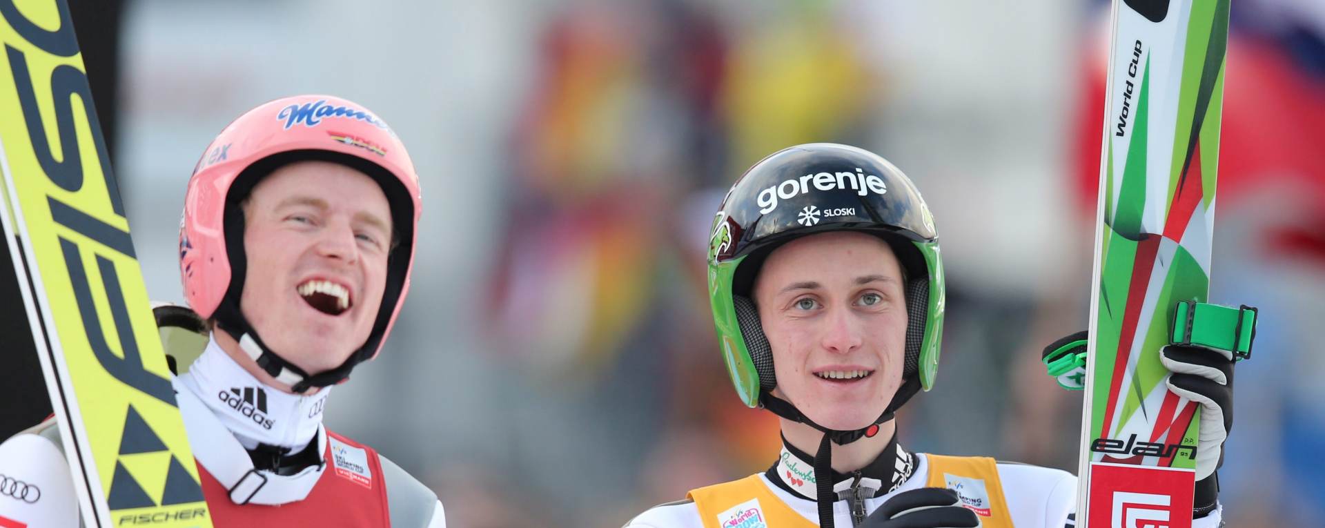 epa05085356 Severin Freund (L) of Germany and Peter Prevc of Slovenia react during the second stage of the Four Hills ski jumping tournament in Garmisch-Partenkirchen, Germany, 01 January 2016.  EPA/DANIEL KARMANN