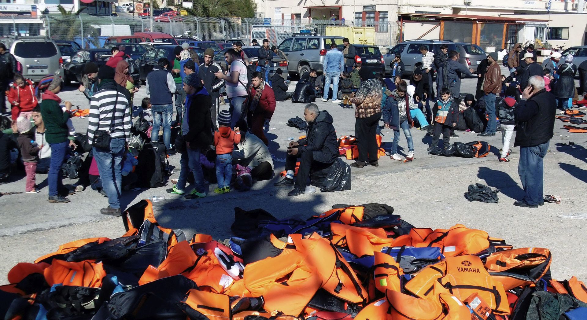 epa05140059 Life vests are piled up after migrants and refugees disembark a coastguard boat in Mytilini, Lesvos Island, Greece, 02 February 2016, The Lesvos coast guard patrol boat 'PATH 80 - Agios Efstratios' on 02 February 2016, rescued 413 migrants and refugees found floating adrift in the sea between the island and the Turkish coast - breaking the record for the number brought to safety in a single rescue operation. 2,000 refugees and migrants to the eastern shores of Lesvos, with the coast guard and Frontex called to rescue 1,000 from boats.  EPA/STRATIS BALASKAS