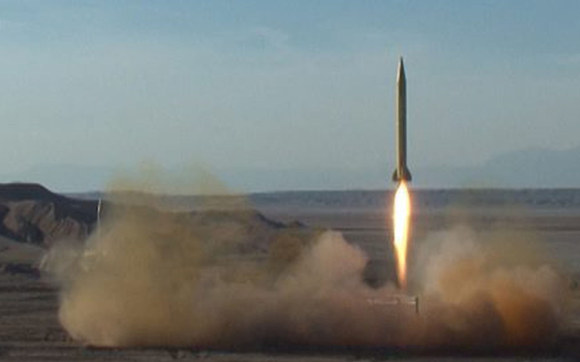 epa05201877 A handout picture made available by the Iranian defence ministry official website shows, an Iranian ballistic missile launch at an undisclosed location, in Iran, on 08 March 2016. Media reported that Iran has tested ballistic missiles again. Several missiles were successfully tested in various parts of the country on 08 March 2016.  EPA/DEFENCE MINISTRY OFFICIAL WEBSITE / HANDOUT  HANDOUT EDITORIAL USE ONLY/NO SALES