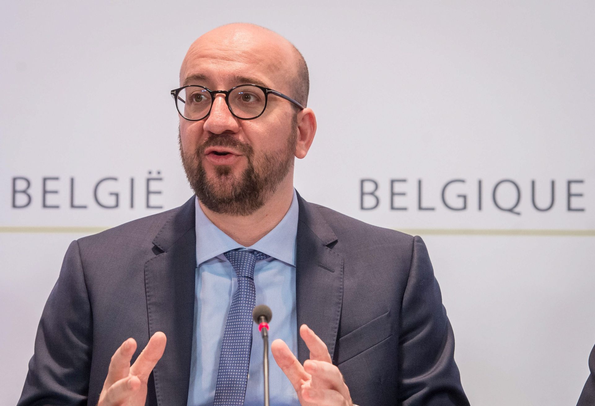 epa05250798 Belgian Prime Minister Charles Michel gives a press conference in Brussels, Belgium, 09 April 2016, after the government sealed Saturday shortly after midnight on budgetary control and a number of further structural reforms.  EPA/STEPHANIE LECOCQ