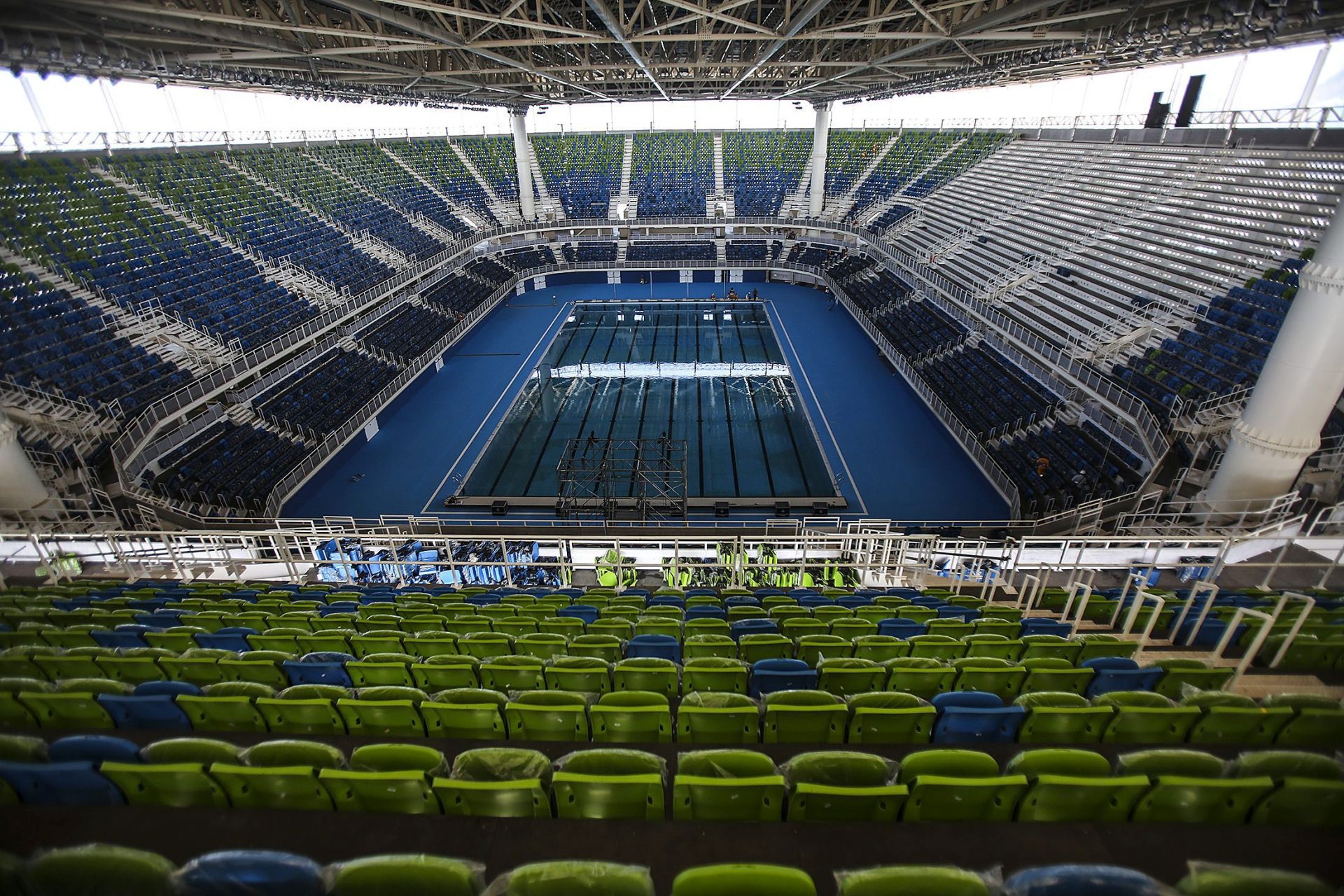 epa05244078 General view of the Estadio Acuatico Olimpico with a capacity for 18 thousand people at the Centro Olimpico in Rio de Janeiro, Brazil, on 04 April 2016. The Estadio Acuatico will be the venue for the swimming competitions and the final of water polo for the Olympic Games Rio 2016.  EPA/Antonio Lacerda