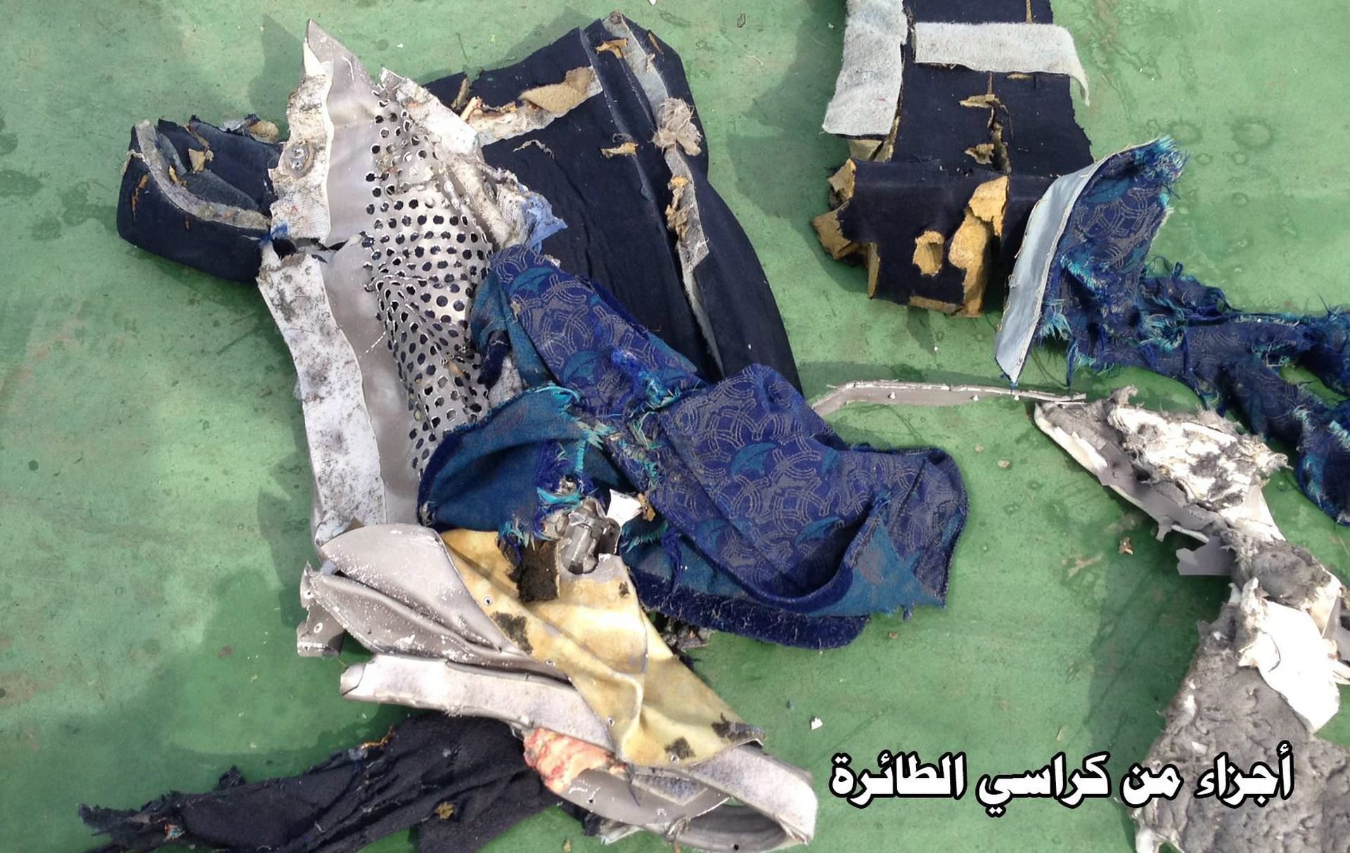 epa05320974 A handout picture made available by the Egyptian Defence Ministry showing pieces of a chair from the EgyptAir MS804 flight missing at sea, unspecified location in Egypt, 21 May 2016. The Armed Forces of Egypt announced that the debris of an EgyptAir Airbus A320, which had disappeared early on 19 May 2016, as well as personal belongings of the passengers are floating in the Mediterranean Sea, north of the Egyptian city of Alexandria. The EgyptAir passenger jet had left Paris bound for Cairo with 66 people on board, but crashed into the Mediterranean Sea for unknown reasons.  EPA/EGYPTIAN DEFENCE MINISTRY / HANDOUT  HANDOUT EDITORIAL USE ONLY/NO SALES