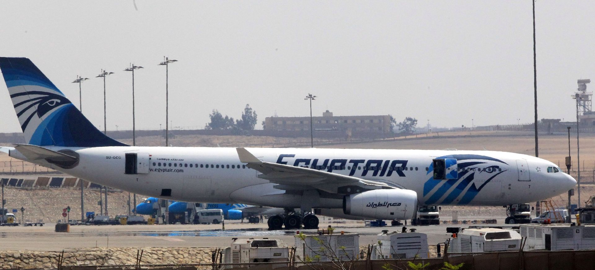epa05315807 (FILE) A file picture dated 29 March 2016 shows aircrafts from Egypt's state-owned carrier, EgyptAir, sitting on a runway at Cairo Airport, Cairo, Egypt. According to media reports quoting Egyptair on 19 May 2016, EgyptAir Airbus A320 Flight MS804 disappeared off radar some 10 miles (16km) after entering Egypt's airspace. The plane, said to be carrying 69 people on board, 59 passengers and 10 crew members, took off from France's Charles de Gaulle airport on 18 May night and was expected to land in Cairo on 19 May early morning. According to the airline's twitter account, they contacted the concerned authorities and bodies for inspections through rescue teams.  EPA/KHALED ELFIQI