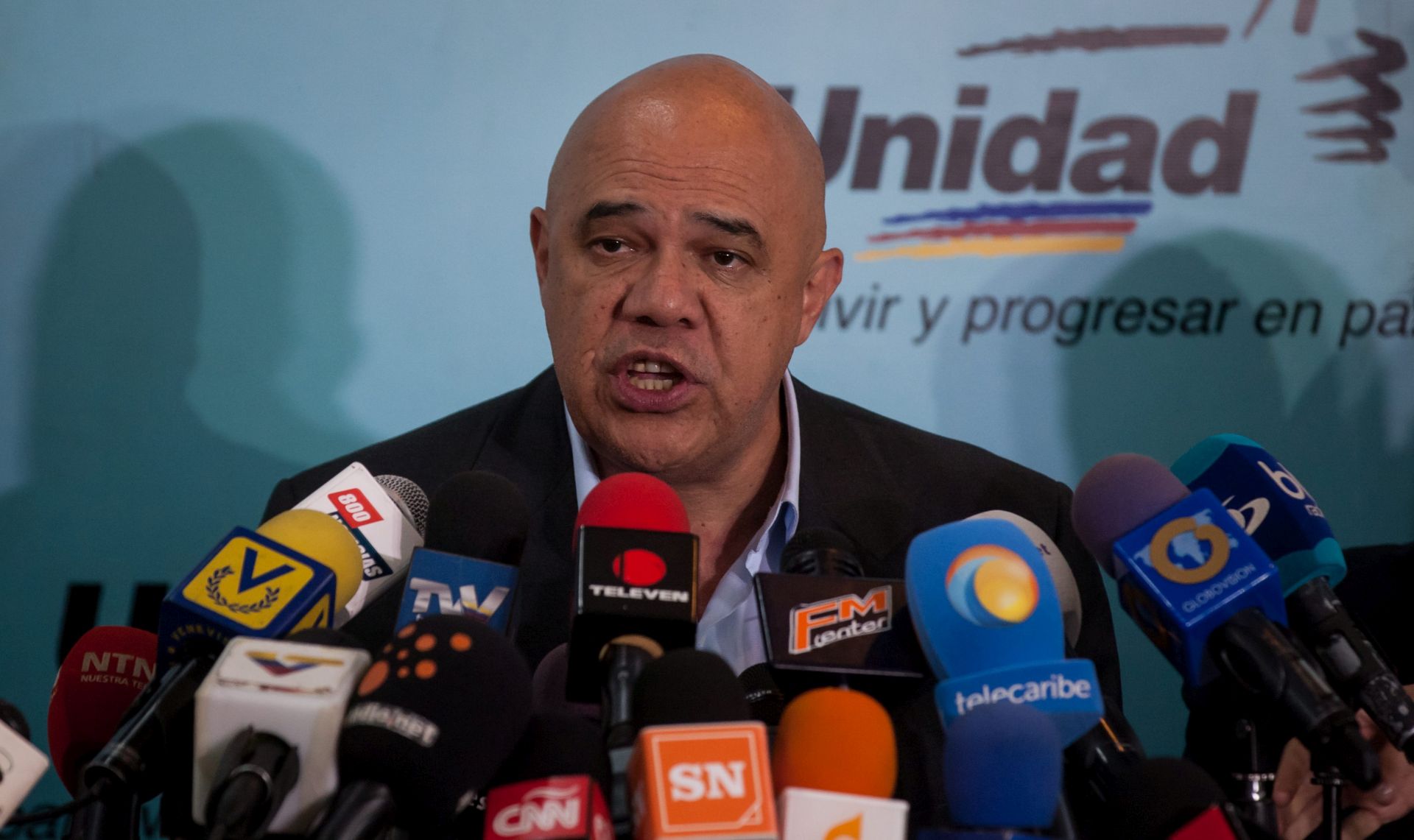 epa05343046 Secretary-General of the Democratic Unity Roundtable (known by the Spanish acronym MUD) opposition coalition Jesus Torrealba speaks during a press conference in Caracas, Venezuela, 02 June 2016. According to media reports, Torrealba encouraged Venezuelan citizens who want a referendum to recall President Nicolas Maduro to 'ratify their signatures' by joining nationwide protest scheduled for 06 June. Venezuela is in the midst of political deadlock with opponents of President Nicolas Maduro calling for his resignation as the Venezuelan economy stagnates, causing dramatic price increases on basic goods across the country. On 02 June, at least 19 journalist were assaulted in downtown Caracas while covering demonstrations organized to protest the increasing cost of basic goods.  EPA/MIGUEL GUTIERREZ