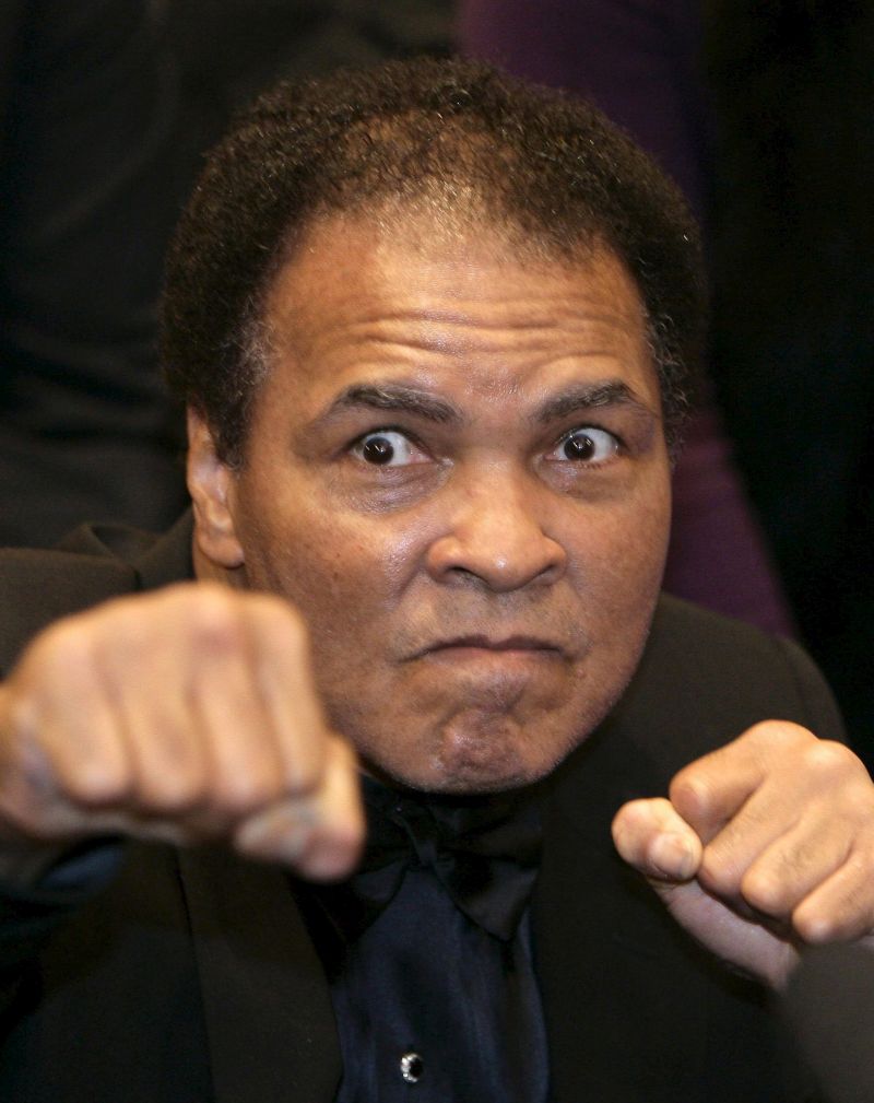 epa05343201 (FILE) Boxing legend Muhammad Ali before the start of the World Championship super-middleweight fight between his daughter, womens boxing World Champion, Laila Ali from US and Asa Sandell from Sweden at the Max Schmeling Hall in Berlin, Germany, 17 December 2005. Ali has been admitted to hospital for respiratory problems, media reported on 03 June 2016.  EPA/PEER GRIMM