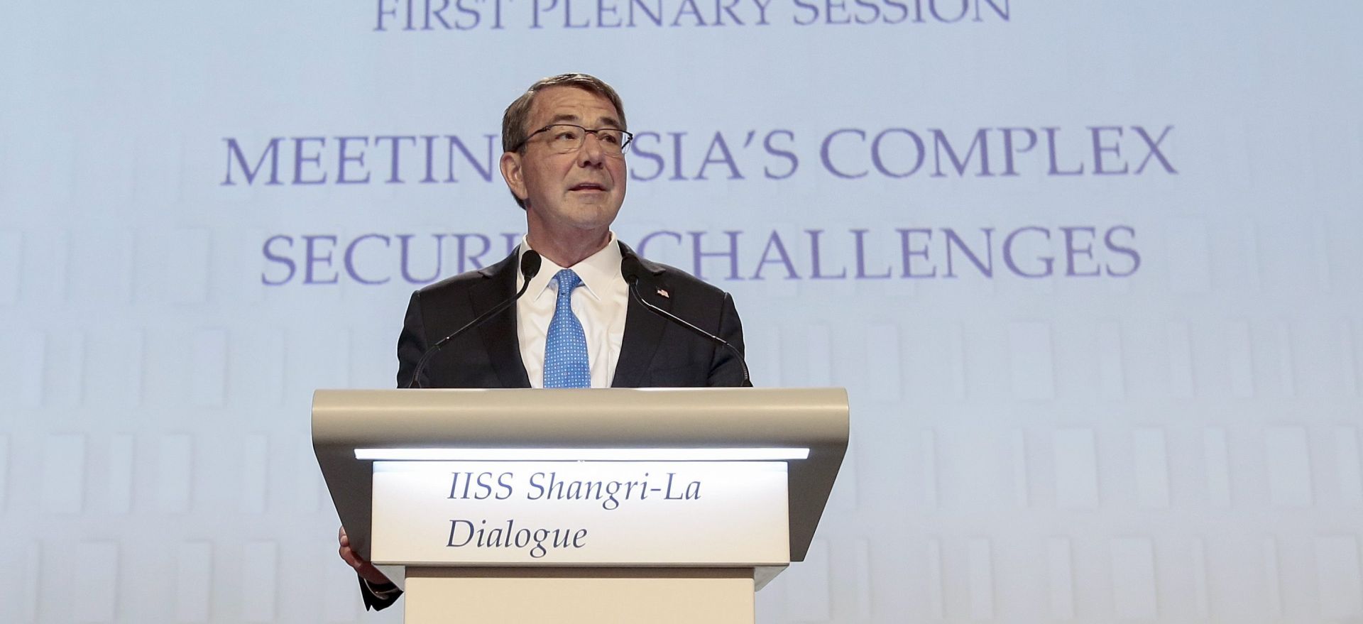 epa05344916 US Secretary of Defense Ashton Carter delivers his speech during the First Plenary Session of the International Institute for Strategic Studies (IISS) 15th Asia Security Summit in Singapore, 04 June 2016. The IISS Asia Security Summit is an annual gathering of defense officials in the Asia-Pacific region and is dubbed the Shangri-La Dialogue in honor of the hotel where the event is held. The summit will run from 03 to 05 June 2016.  EPA/WALLACE WOON