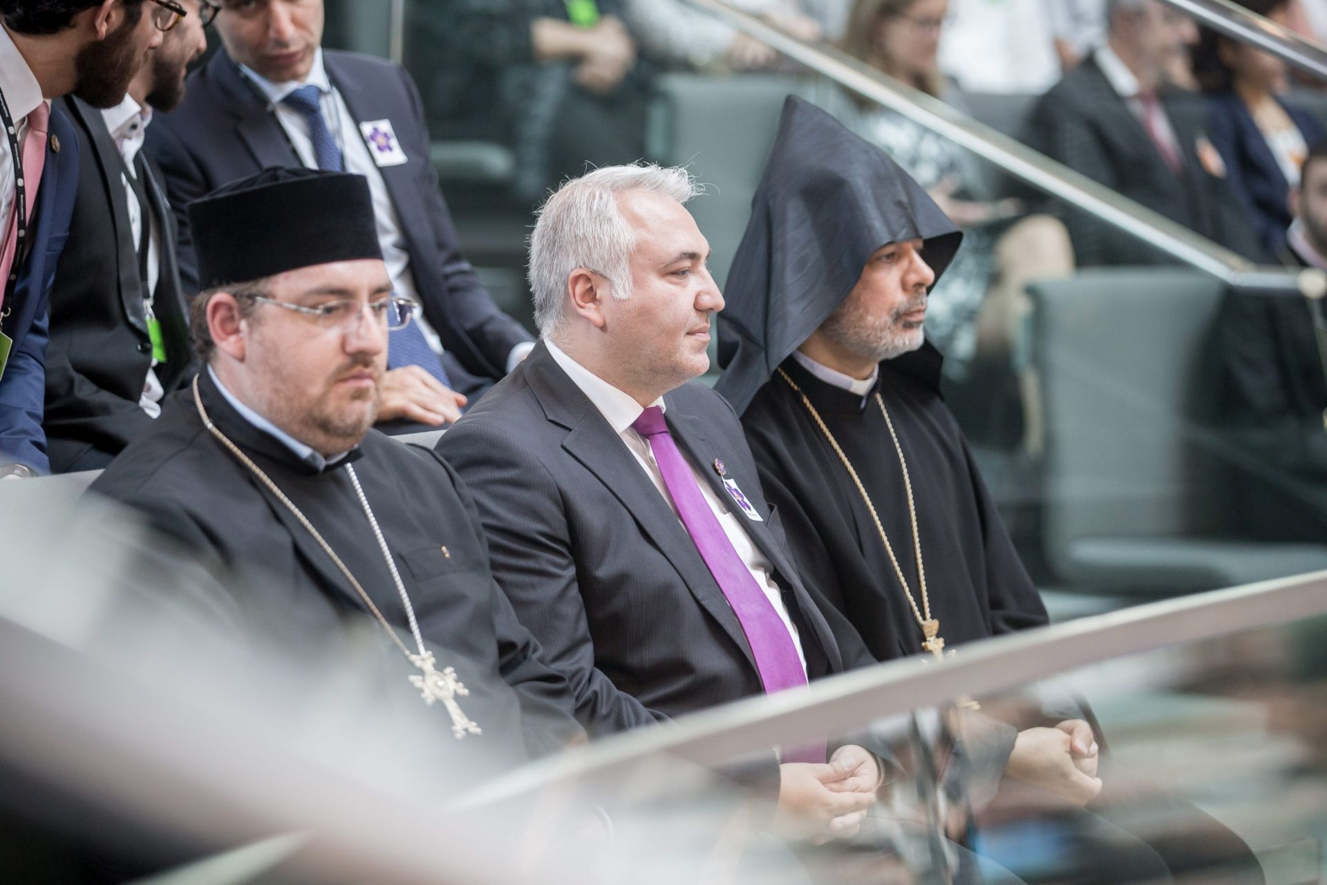 epa05341618 (R-L) Serovpe Isakhanyan, episcopal vicar of the Armenian church in Germany, Ilias Kevork Uyar of 'Acknowledgement Now' group, and pastor Diradur Sardaryan attend a session of the German Parliament in Berlin, Germany, 02 June 2016. The session focusses on the regulation of prostitution and the acknowledgement of the Armenian genocide of 1915-16.  EPA/MICHAEL KAPPELER