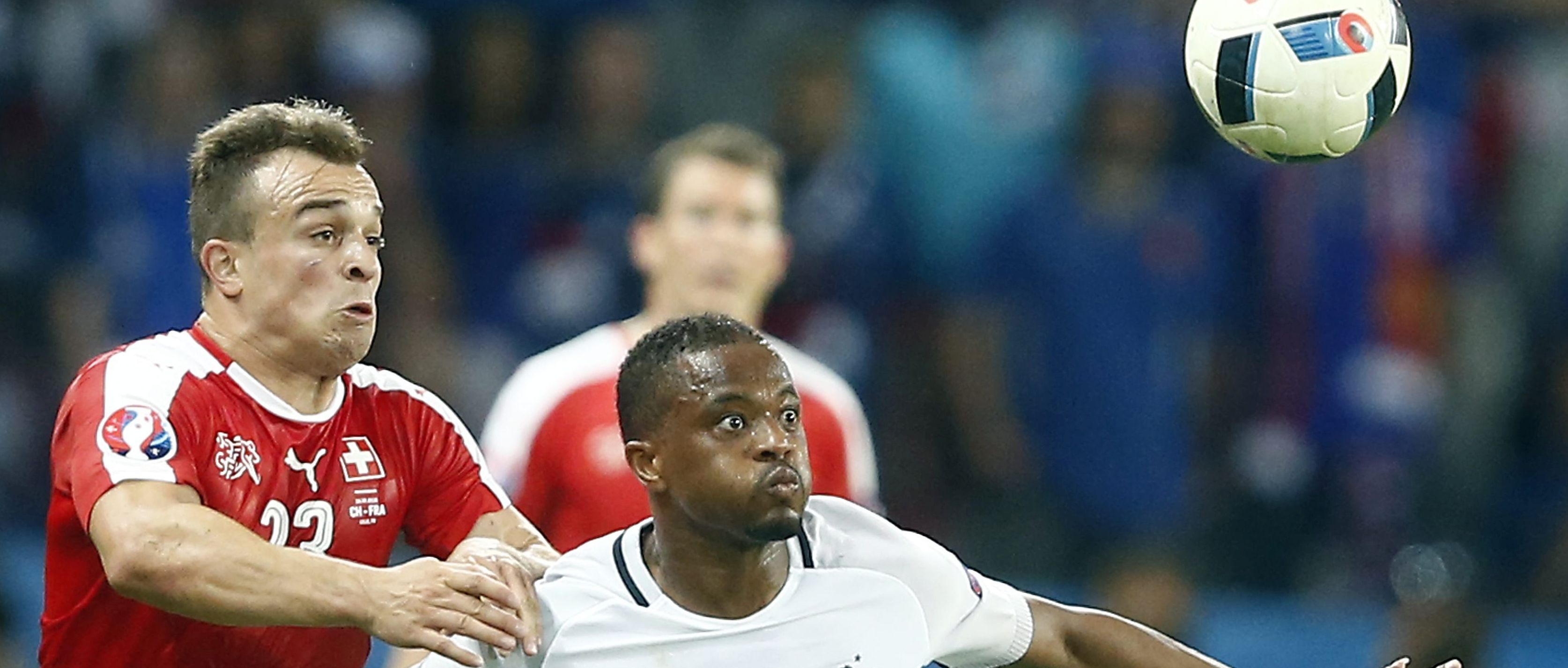 epa05378213 Xherdan Shaqiri of Switzerland (L) and Patrice Evra of France in action during the UEFA EURO 2016 group A preliminary round match between Switzerland and France at Stade Pierre Mauroy in Lille Metropole, France, 19 June 2016.

(RESTRICTIONS APPLY: For editorial news reporting purposes only. Not used for commercial or marketing purposes without prior written approval of UEFA. Images must appear as still images and must not emulate match action video footage. Photographs published in online publications (whether via the Internet or otherwise) shall have an interval of at least 20 seconds between the posting.)  EPA/ROLEX DELA PENA   EDITORIAL USE ONLY
