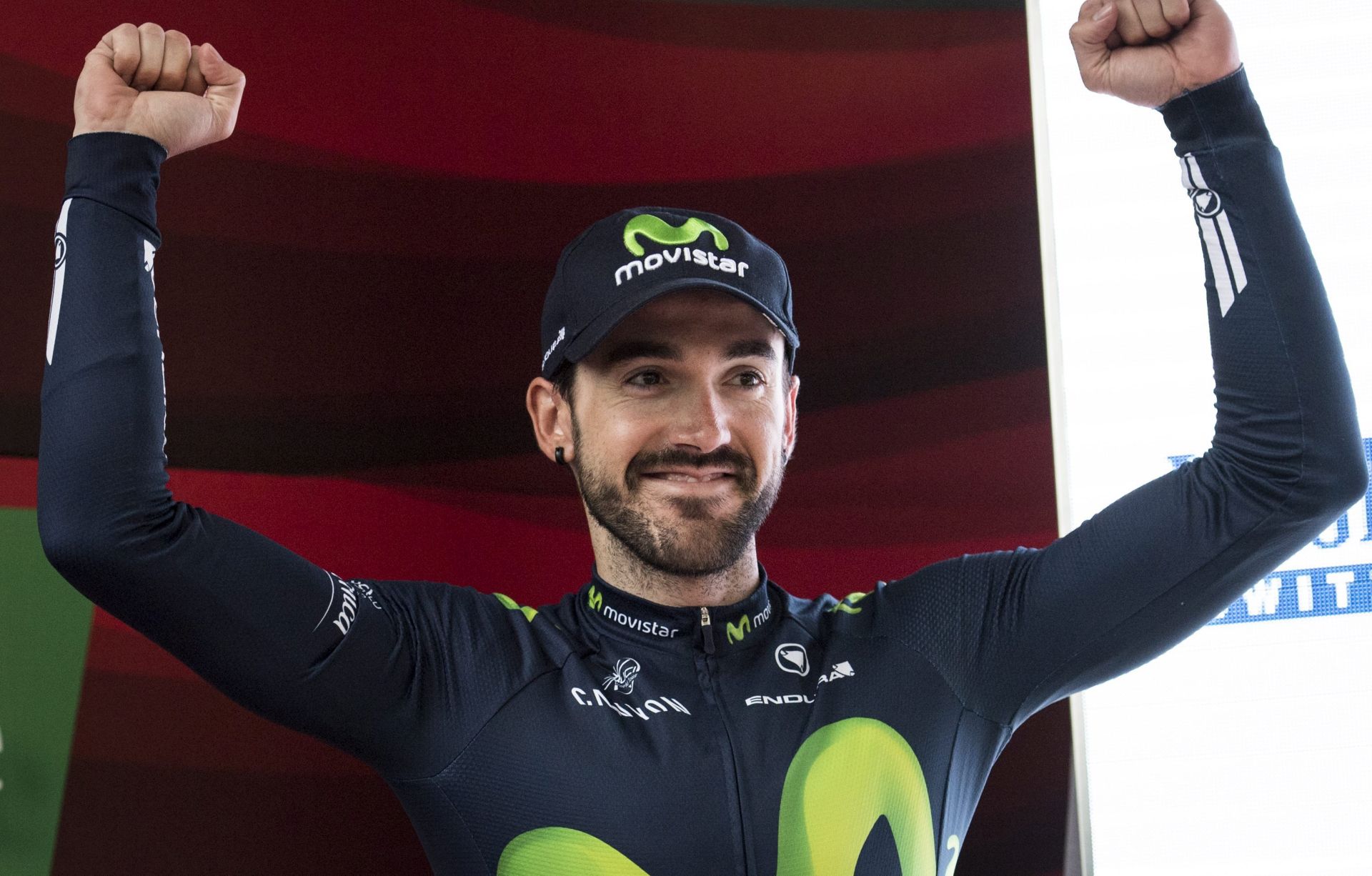 epa05375453 Jon Izaguirre Insausti from Spain of Movistar Team celebrates after the 8th stage of the 80th Tour de Suisse UCI ProTour cycling race, in Davos, Switzerland, 18 June 2016.  EPA/GIAN EHRENZELLER