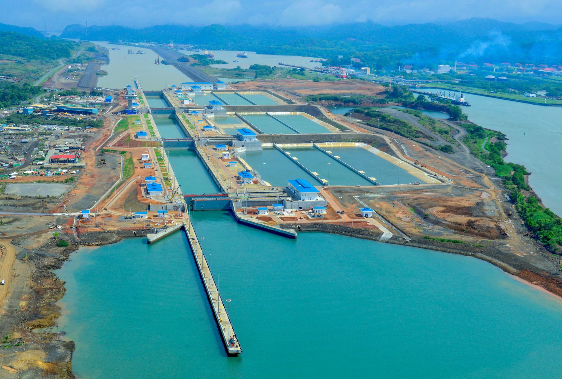 epa05392588 A handout picture realeased by the Panama Canal Authority (PCA) shows an aerial view of new Agua Clara locks in the expanded Panama Canal in Panama, 26 June 2016. The Neopanamax cargo ship Cusco Shipping Panama's passage inaugurated the Panama Canal expansion.  EPA/PANAMA CANAL AUTHORITY / HANDOUT EDITORIAL USE ONLY/NO SALES HANDOUT EDITORIAL USE ONLY/NO SALES