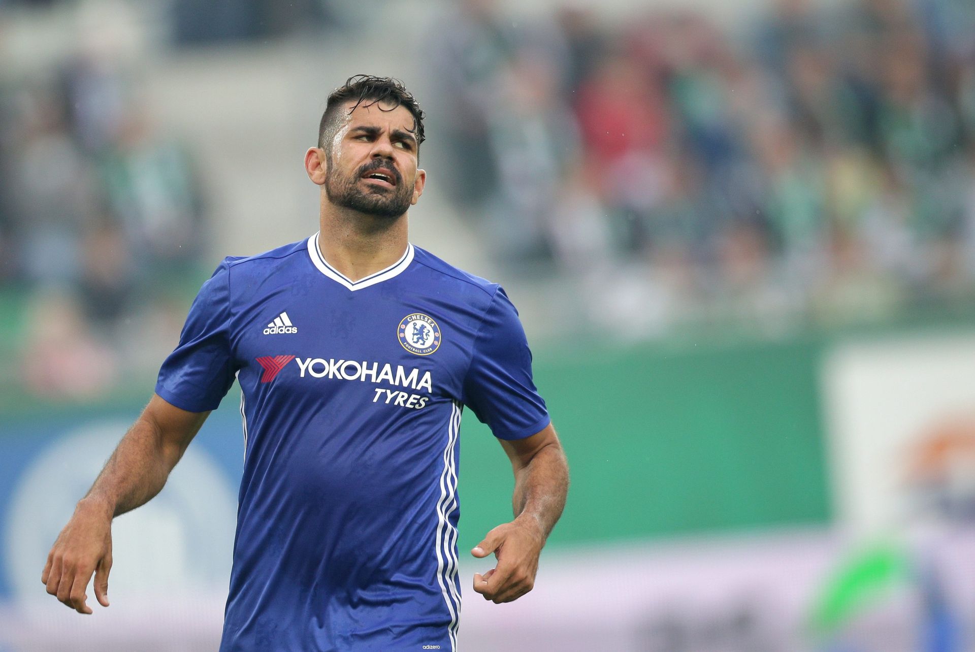 epa05428372 Chelsea FC's Diego Costa reacts during the friendly soccer match against SK Rapid Wien at the newly built Allianz Stadion in Vienna, Austria, 16 July 2016. SK Rapid Wien's new home side was officially opened today by a ceremony reaching its highlight in the soccer game agianst England's Chelsea FC.  EPA/LISI NIESNER