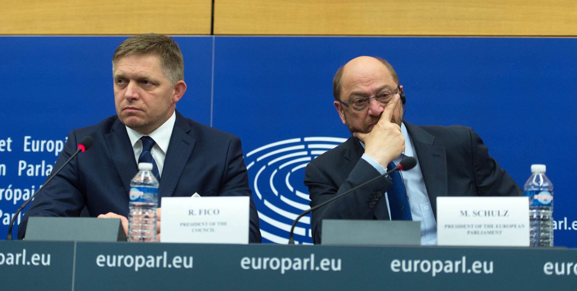 epa05410176 Slovakian Prime Minister Robert Fico (L) and Martin Schulz (R), President of the European Parliament, react during a press conference in the European Parliament in Strasbourg, France, 06 July 2016. Council and Commission statements on the Programme of activities of the EU's Slovakian Presidency were due to be delivered to the parliament.  EPA/PATRICK SEEGER