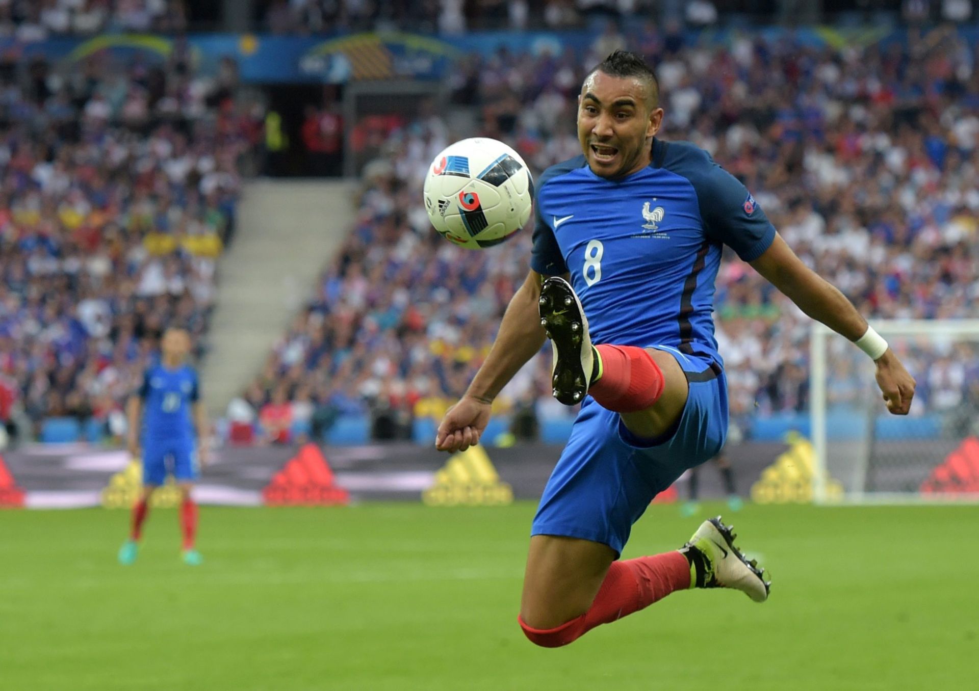 epa05355735 Dimitri Payet of France in action during the UEFA EURO 2016 group A preliminary round match between France and Romania at Stade de France in Saint-Denis, France, 10 June 2016.

(RESTRICTIONS APPLY: For editorial news reporting purposes only. Not used for commercial or marketing purposes without prior written approval of UEFA. Images must appear as still images and must not emulate match action video footage. Photographs published in online publications (whether via the Internet or otherwise) shall have an interval of at least 20 seconds between the posting.)  EPA/GEORGI LICOVSKI   EDITORIAL USE ONLY