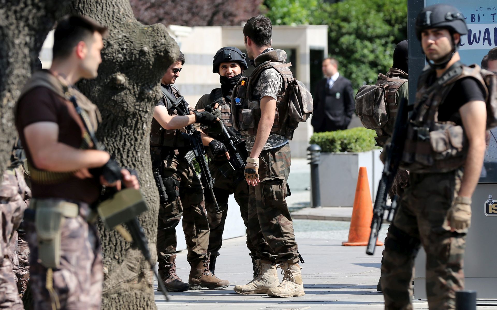 epa05430478 Turkish special forces members with heavy weapons secure the area during a security meeting between 1st Army Commander Gen. Umit Dundar and Istanbul Police Chief Mustafa Caliskan, in Istanbul, Turkey, 18 July 2016. Turkish Prime Minister Yildirim reportedly said that the Turkish military was involved in an attempted coup d'etat. Turkish President Recep Tayyip Erdogan has denounced the coup attempt as an 'act of treason' and insisted his government remains in charge. Some 104 coup plotters were killed, 90 people - 41 of them police and 47 are civilians - 'fell martrys', after an attempt to bring down the Turkish government, the acting army chief General Umit Dundar said in a televised appearance.who were killed in a coup attempt on 16 July, during the funeral, in Istanbul, Turkey, 17 July 2016. Turkish Prime Minister Yildirim reportedly said that the Turkish military was involved in an attempted coup d'etat. Turkish President Recep Tayyip Erdogan has denounced the coup attempt as an 'act of treason' and insisted his government remains in charge. Some 104 coup plotters were killed, 90 people - 41 of them police and 47 are civilians - 'fell martrys', after an attempt to bring down the Turkish government, the acting army chief General Umit Dundar said in a televised appearance.  EPA/TOLGA BOZOGLU