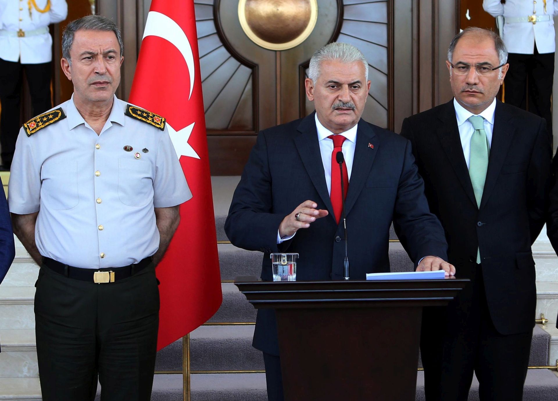 epa05427625 Chief of Staff General Hulusi Akar (L), Turkey's Prime Minister Binali Yildirim (C) and Interior Minister Efkan Ala (R) address a news conference, in Ankara,  Turkey, 16 July 2016. Turkish Prime Minister Yildirim reportedly said that the Turkish military was involved in an attempted coup d'etat. The Turkish military meanwhile stated it had taken over control. According to news reports, Turkish President Recep Tayyip Erdogan has denounced the coup attempt as an 'act of treason' and insisted his government remains in charge. Some 104 coup plotters were killed, 90 people - 41 of them police and 47 are civilians - 'fell martrys', after an attempt to bring down the Turkish government, the acting army chief General Umit Dundar said in a televised appearance.  EPA/STR