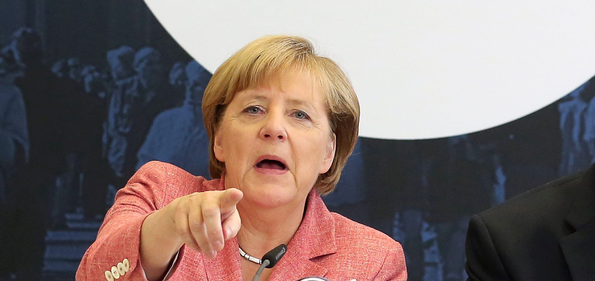 epa05527282 German Chancellor Angela Merkel gestures during the Economy Day of the CDU at Konrad Adenauer Haus in Berlin, Germany, 06 September 2016.  EPA/WOLFGANG KUMM