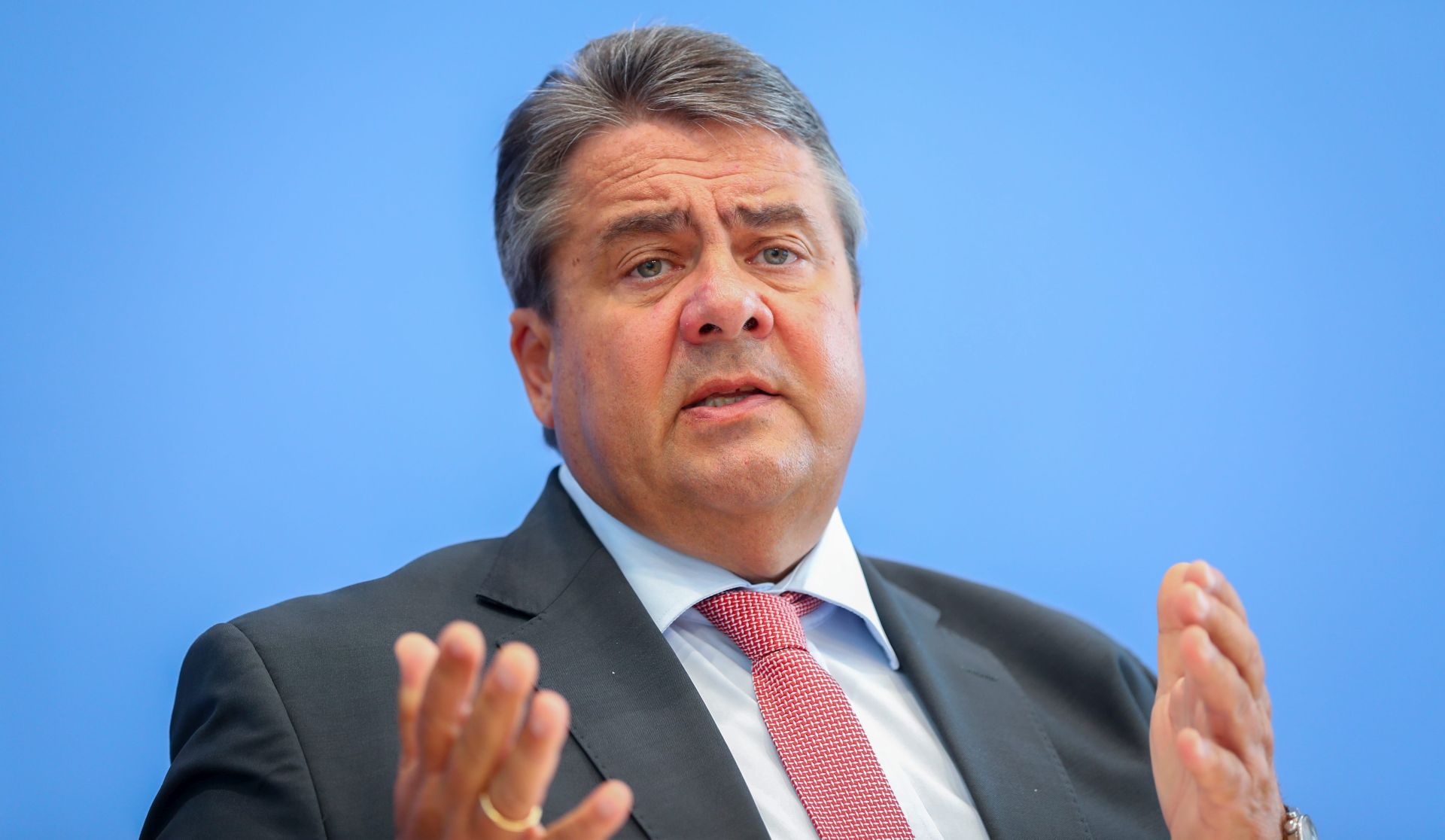 epa05515218 German Business Secretary Sigmar Gabriel speaks at a press conference about the agreement on the energy package and the free trade agreements TTIP and CETA in Berlin, Germany, 30 August 2016.  EPA/KAY NIETFELD