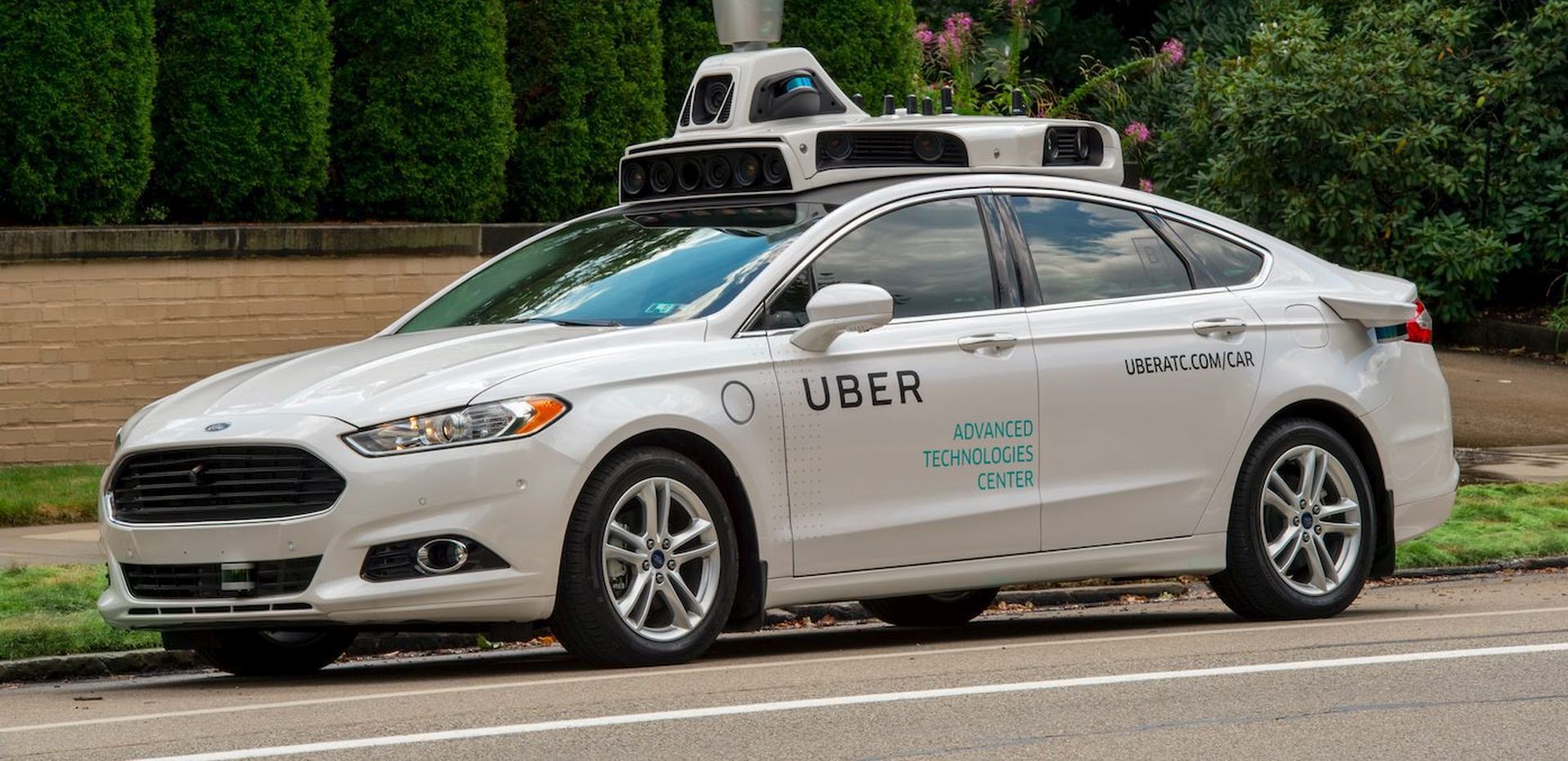 epa05540025 An undated handout photo provided by Uber on 14 September 2016 shows an Uber self-driving car, in Pittsburgh, Pennsylvania, USA. The online ride-sharing and transportation company announced on 14 September 2016 that the world's first Self-Driving Uber is in circulation on the roads in Pittsburgh as part of an initial trial. The Slef-Driving Ubers will have a safety driver in the front seat because the cars still require human intervention in certain conditions, including bad weather.  EPA/UBER / HANDOUT MANDATORY CREDIT: UBER HANDOUT EDITORIAL USE ONLY/NO SALES