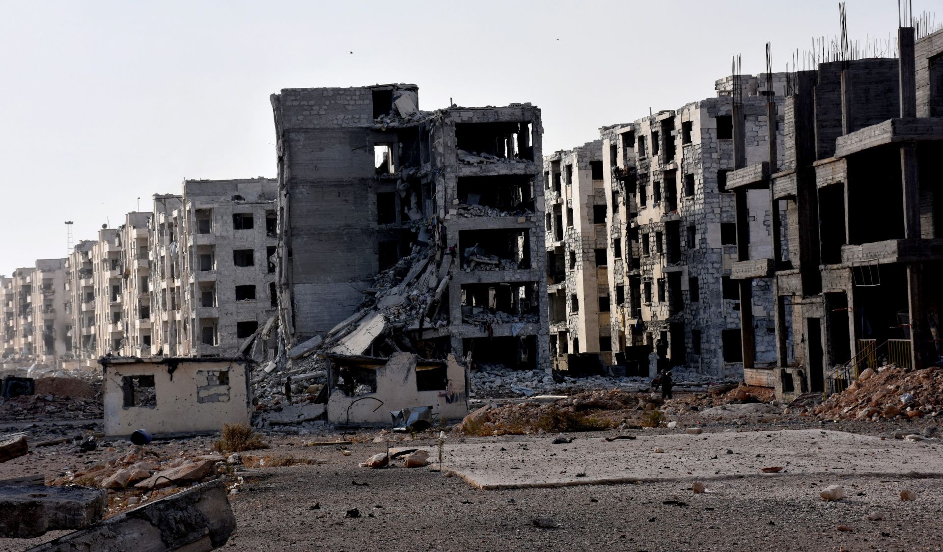 epa05623268 Damaged buildings in the area 1070 apartment in Aleppo province, Syria, 08 November 2016. According to media the Syrian army's control over the project in 1070 an apartment south-west city of Aleppo after fierce battles, by Syrian forces against the al-Father Army forces, where Syrian army heading for control of the Al Hekmeh and the Al-rashidine area and suburb Assad School.  EPA/STR