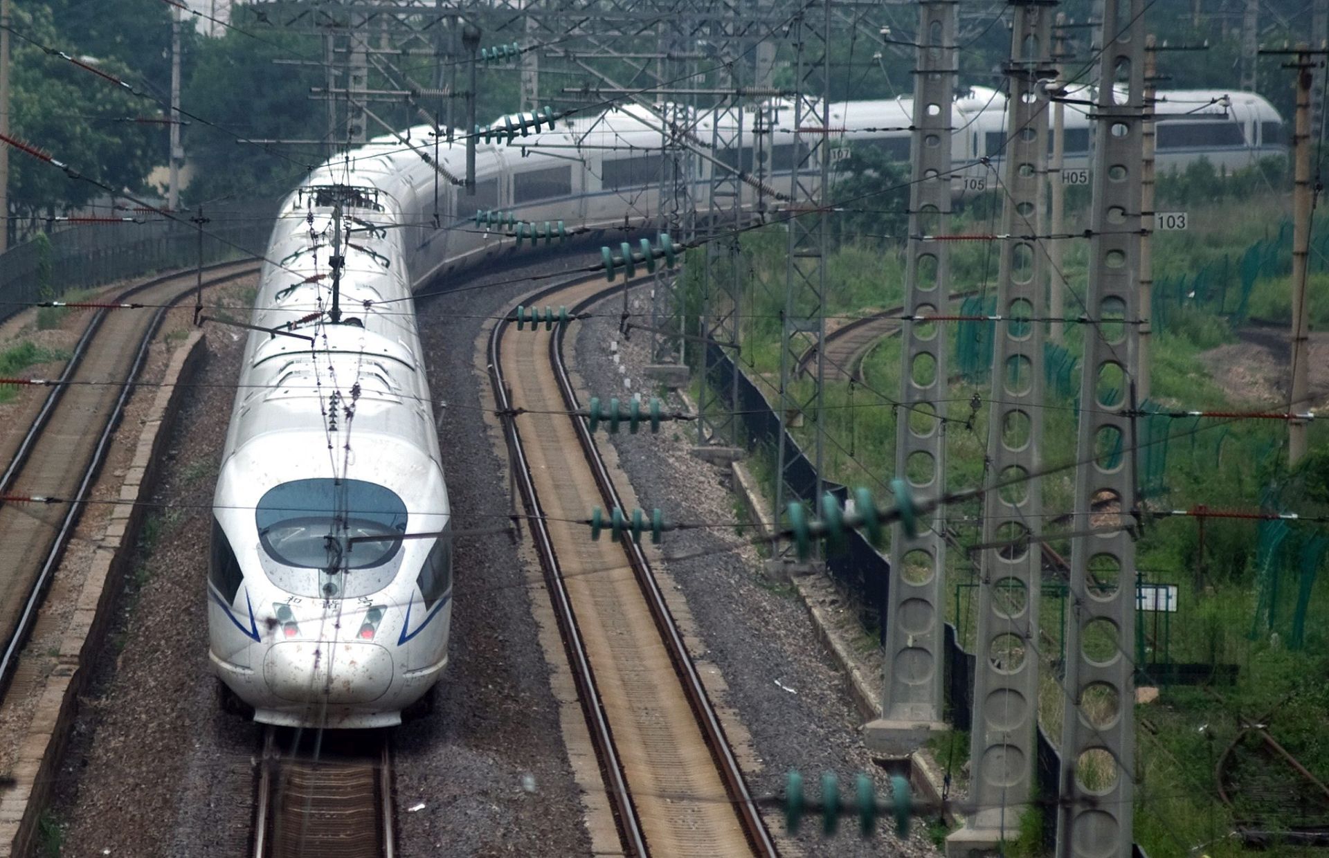 epa04392357 (FILE) A file photo dated 04 August 2011 showing a China Railway High-speed (CRH) train travelling through Qingdao city, eastern China's Shandong province. China's railway authority said that it will ensure 'absolute safety' in the operation of high-speed railways after a deadly train crash on July 23 that claimed 40 dead and injured 191 others. By the end of 2010, 8,358 km of high-speed railways had been put into operation in China, ranking first in the world in terms of length.  EPA/WU HONG. China will speed up the construction of its high-speed railway network, already the world's largest, official media reported 09 September 2014. The state railway company said it had increased investment in the first eight months of the year by 20 per cent, the Xinhua news agency reported. China will spend 800 billion yuan (130 billion dollars) on expanding its rail network this year. There are currently more than 10,000 kilometres of high-speed rail lines in China.  EPA/WU HONG