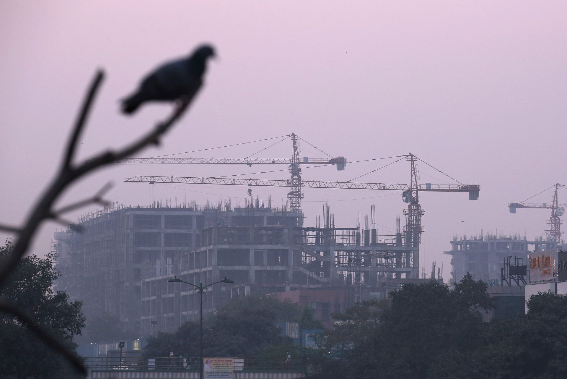 epa05638153 A general view of a construction site in New Delhi, India, 19 November 2016. According to news reports, environment and health authorities in India are becoming more concerned about a new air pollutant, known as Particulate Matter 1 (PM1), which are particles finer than the thickness of a human hair and suspended in air. These pollutants are primarily caused by vehicles, factories and construction sites.  EPA/RAJAT GUPTA