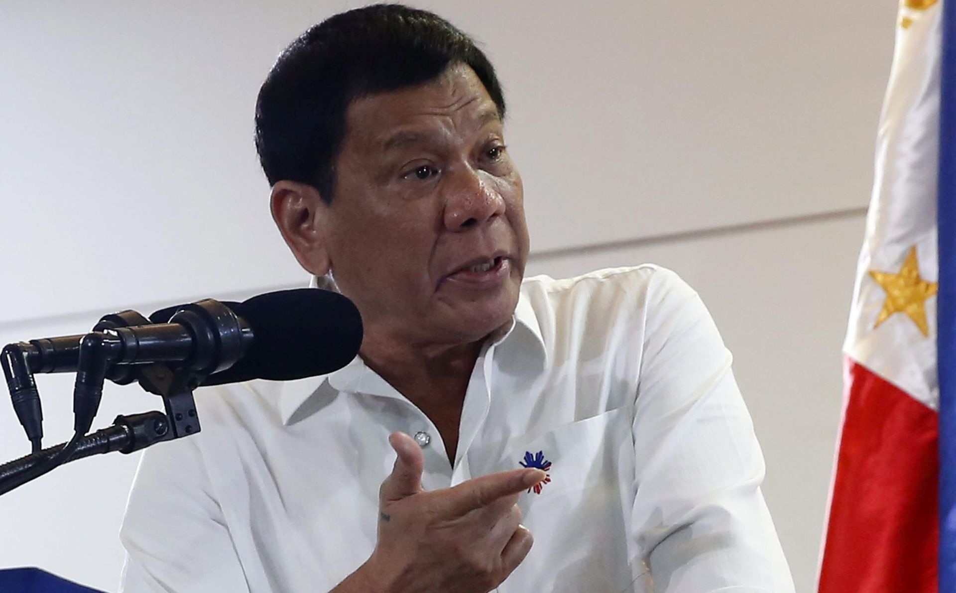 epa05645116 A handout picture dated and released on 24 November 2016 by the Presidential Photographers Division (PPD) shows Filipino President Rodrigo Duterte speaking following his arrival from his APEC trip, at Davao City international airport, Philippines. The Filipino president has announced his intention to open up several economic sectors of the country to new investors to achieve faster development and greater social equality, according to a statement released by the Filipino presidency. The president added the government is finalizing the details to allow the entry of new firms in the field of information and communications to promote competitiveness and improve quality of services. Duterte's announcement comes at a time of a major foreign policy shift in the Philippines, which has been distancing itself from traditional ally the United States and moving closer to China and Russia.  EPA/RICHARD MADELO/ PPD / HANDOUT  HANDOUT EDITORIAL USE ONLY/NO SALES