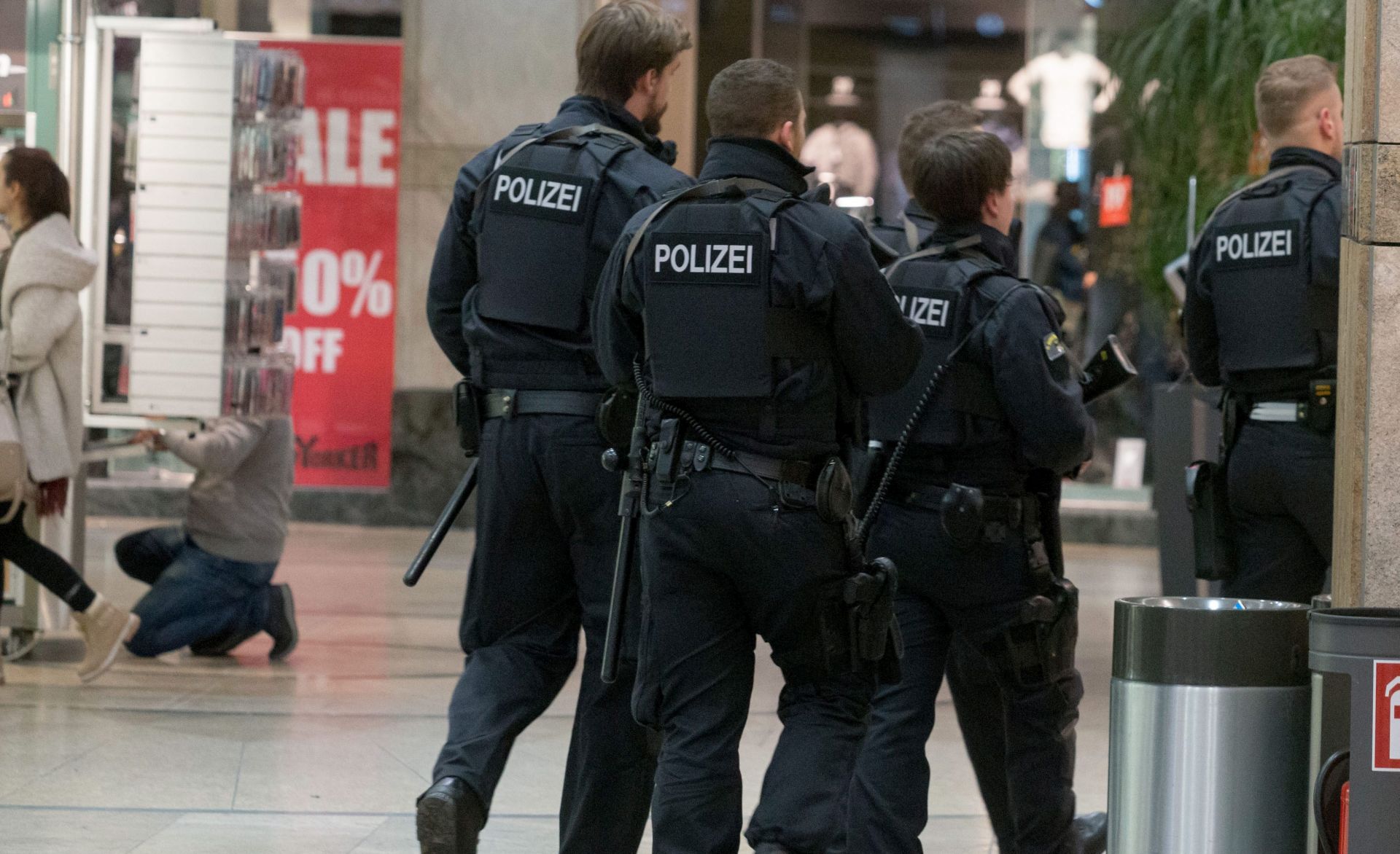 epa05686224 A unit of police officers is seen during a security operation in the shopping center Centro in Oberhausen, Germany, 22 December 2016. German police arrested two men in Duisburg on suspicion of a possible attack preparation at a shopping center. The two brothers, 28 and 31, originally from Kosovo, were suspected of planning an attack on the Centro shopping center in Oberhausen, near the Dutch border, media reported.  c