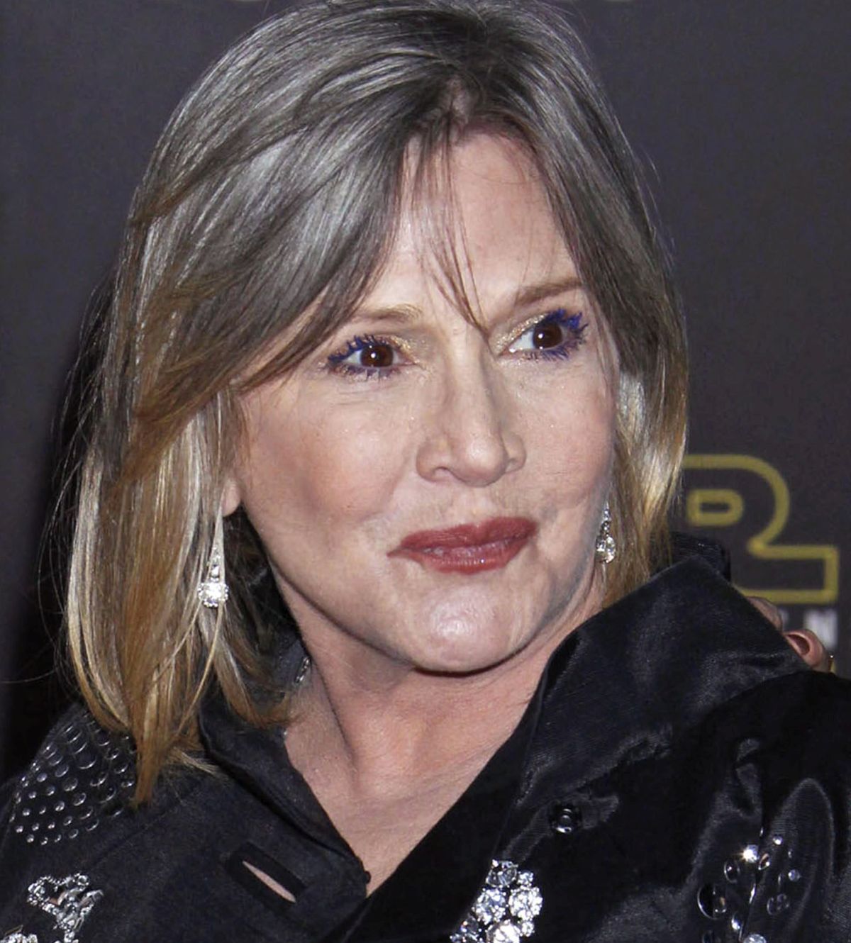 epa05689536 (FILE) - A file picture dated 14 December 2015 shows US actress Carrie Fisher attending the premiere of 'Star Wars: The Force Awakens' at the TCL Theatre in Hollywood, California, USA. According to media reports, Carrie Fisher has died aged 60 in Los Angeles on 27 December 2016, citing her daughter's publicist.  EPA/JIMMY MORRISS