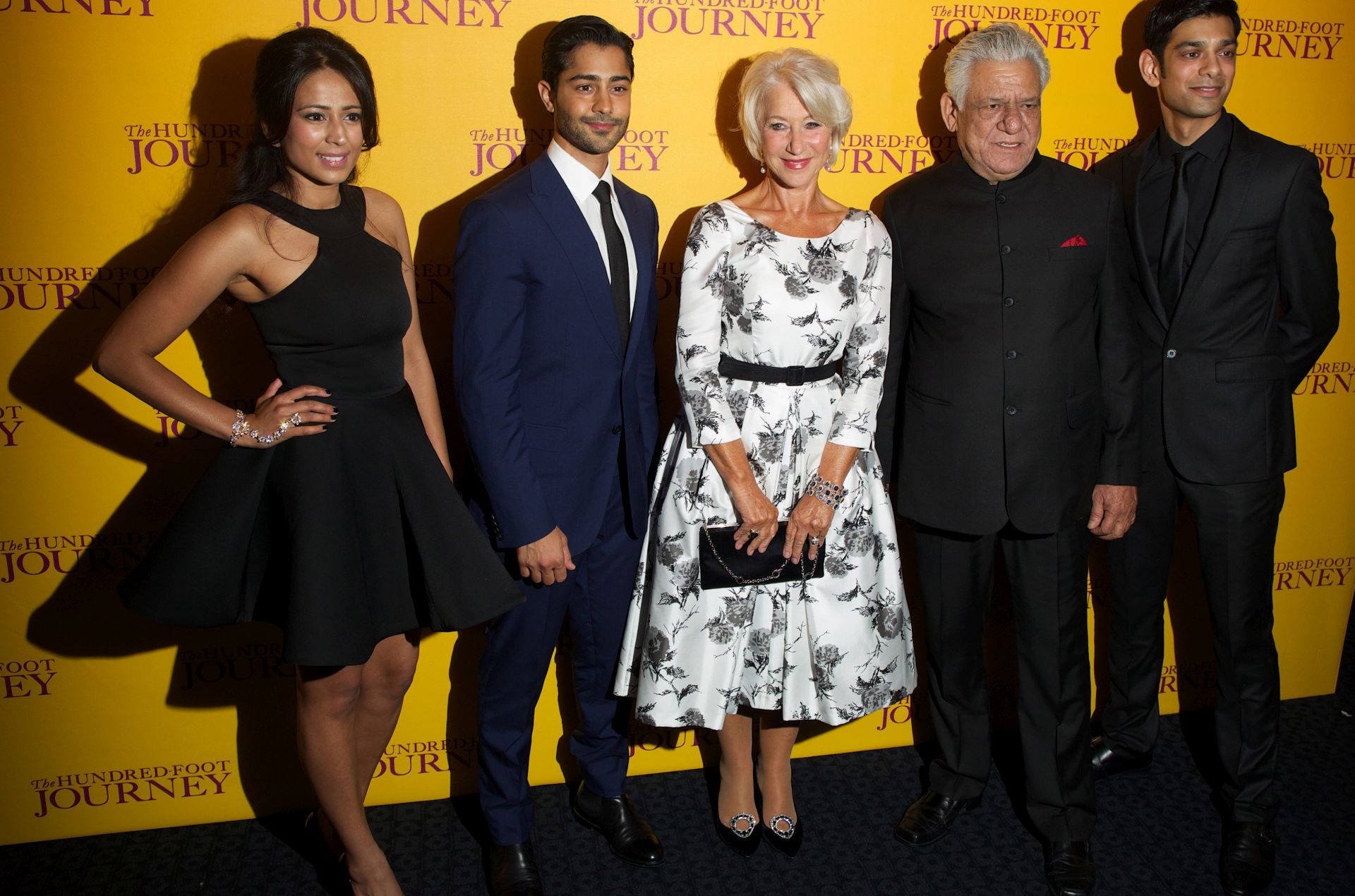 epa04382840 (L-R) British actress Farzana Due Elahe, US actor Manish Dayal, British actress Helen Mirren, Indian actor Om Puri and British actor Amit Shah arrive for the Gala Screening of 'The Hundred-Foot Journey' at the Curzon Mayfair in London, Britain, 03 September 2014. The movie opens in British theaters on 05 September.  EPA/ANDREW COWIE