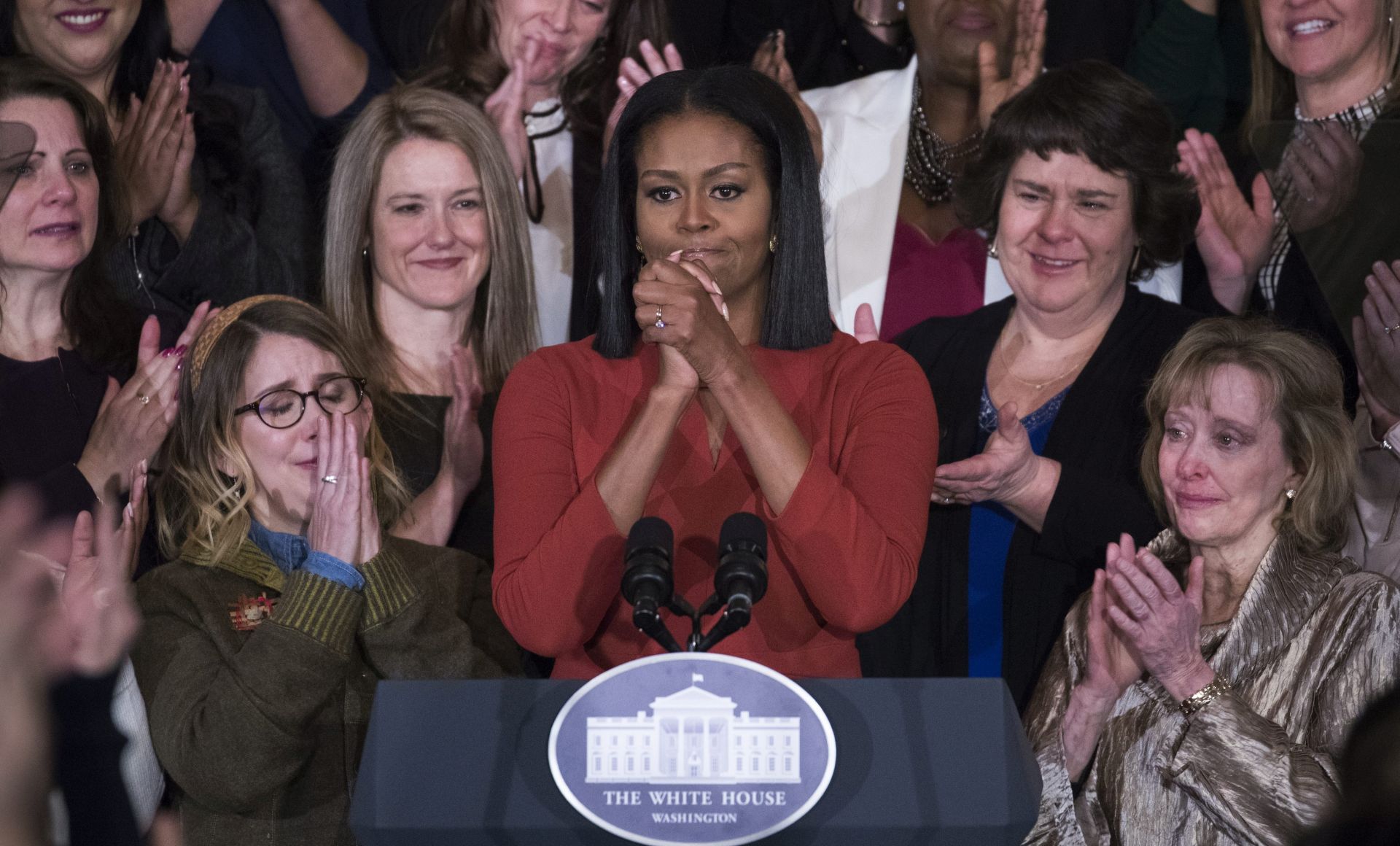 epa05702023 US First Lady Michelle Obama pauses while delivering her final remarks as First Lady during a ceremony to honor the school counselor of the year in the East Room of the White House in Washington, DC, USA, 06 January 2017.  EPA/SHAWN THEW
