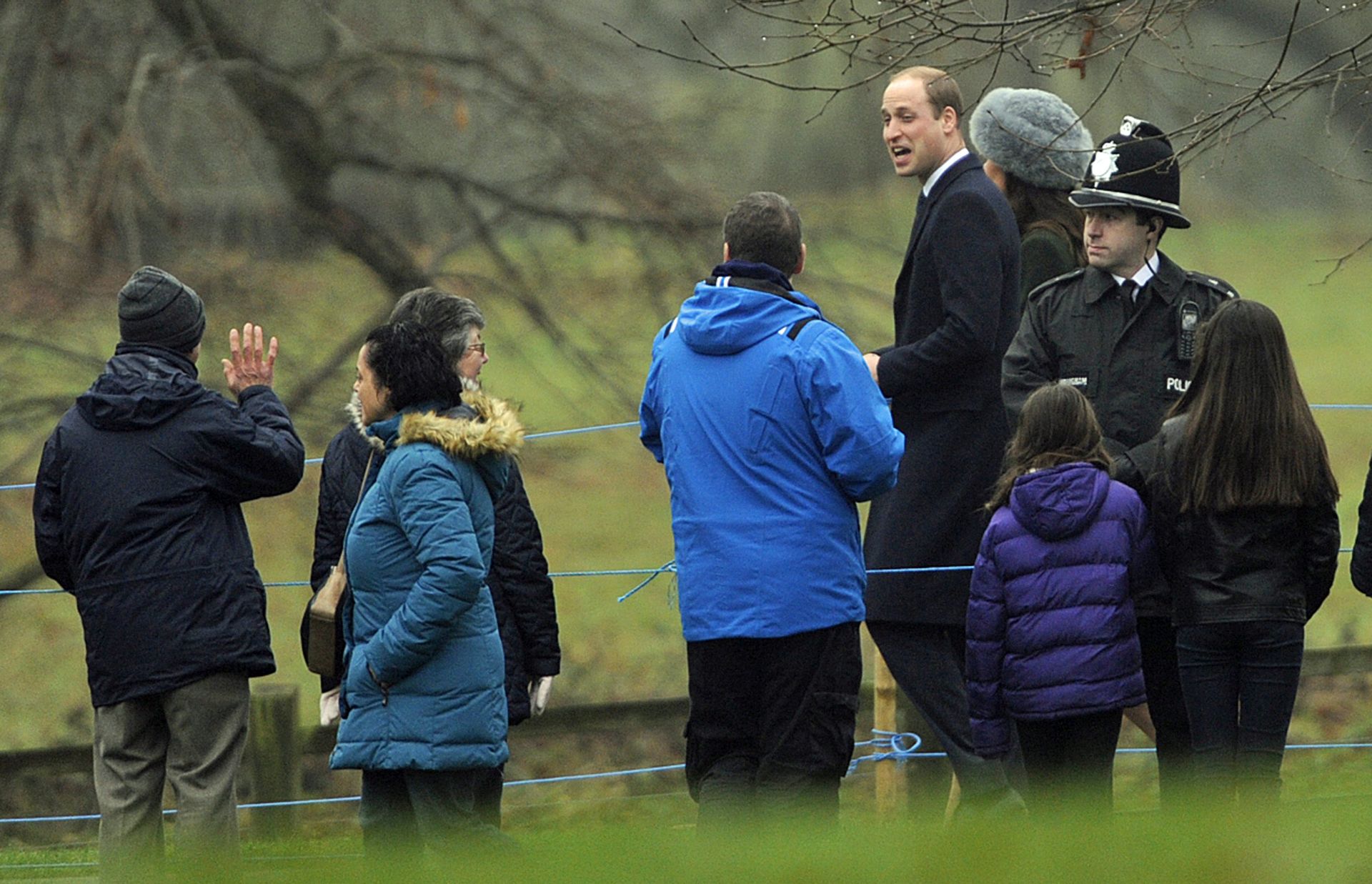 epa05704825 Prince William and his wife Kate the Duke and Duchess of Cambridge walk through the Sandringham Estate after a church service with Queen Elizabeth at St. Mary Magdalene Church in Sandringham, Norfolk 08 January 2017. The Queen has recovered from a recent illness which prevented her from attending church over Christmas.  EPA/GERRY PENNY