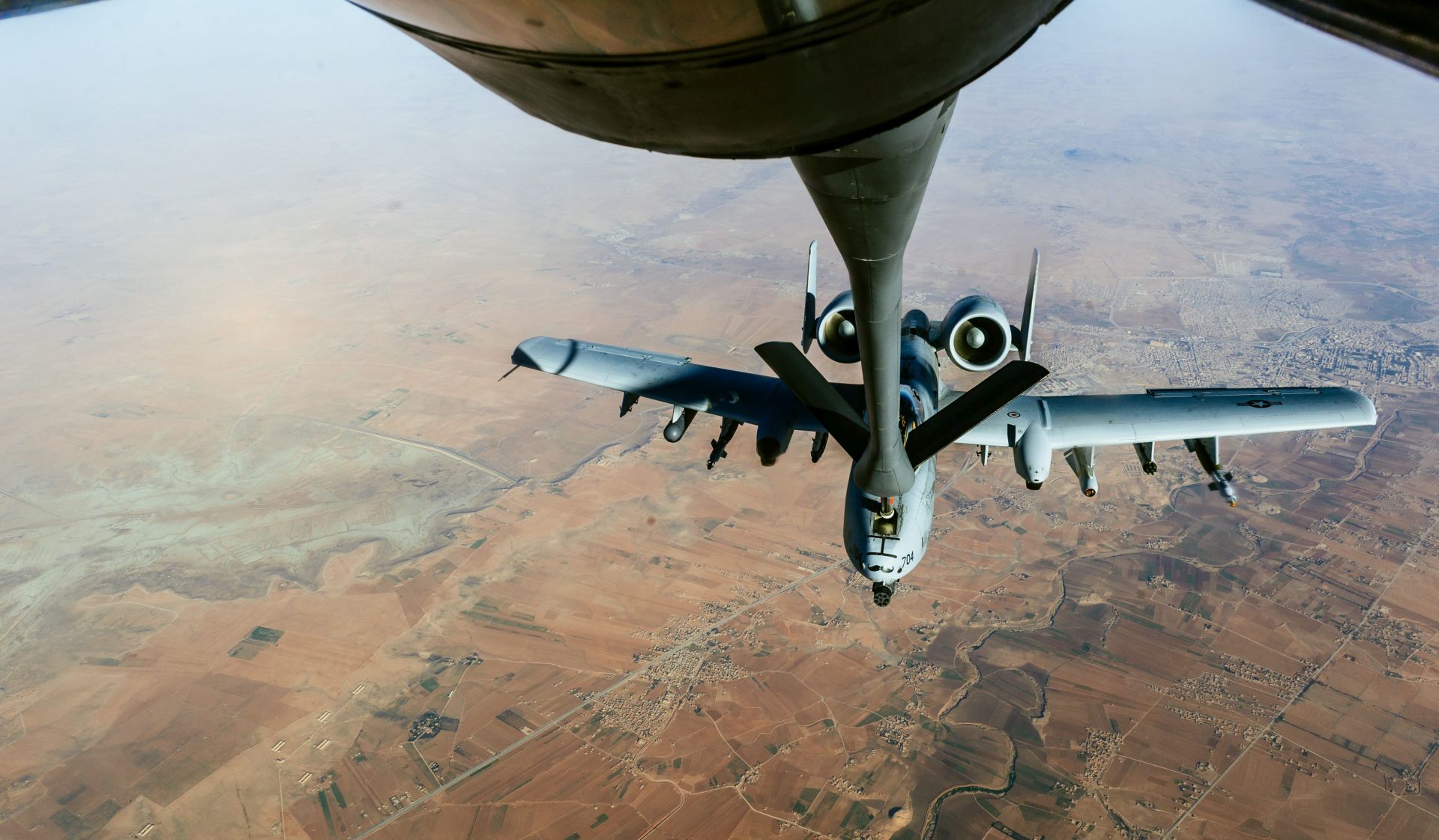 epa05716451 A handout photo made available by the US Department of Defense shows a US Air Force A-10 Thunderbolt II aircraft refuelling from a 340th Expeditionary Air Refueling Squadron KC-135 Stratotanker over Iraq, 11 January 2017 (issued 14 January 2017). US armed forces are currently fighting against Islamic State (IS, or ISIS) militants in Iraq.  EPA/JORDAN CASTELAN / US DEPARTMENT OF DEFENSE HANDOUT Earon Brown, Capt., 379th PA, earon.brown@auab.afcent.af.mil HANDOUT EDITORIAL USE ONLY