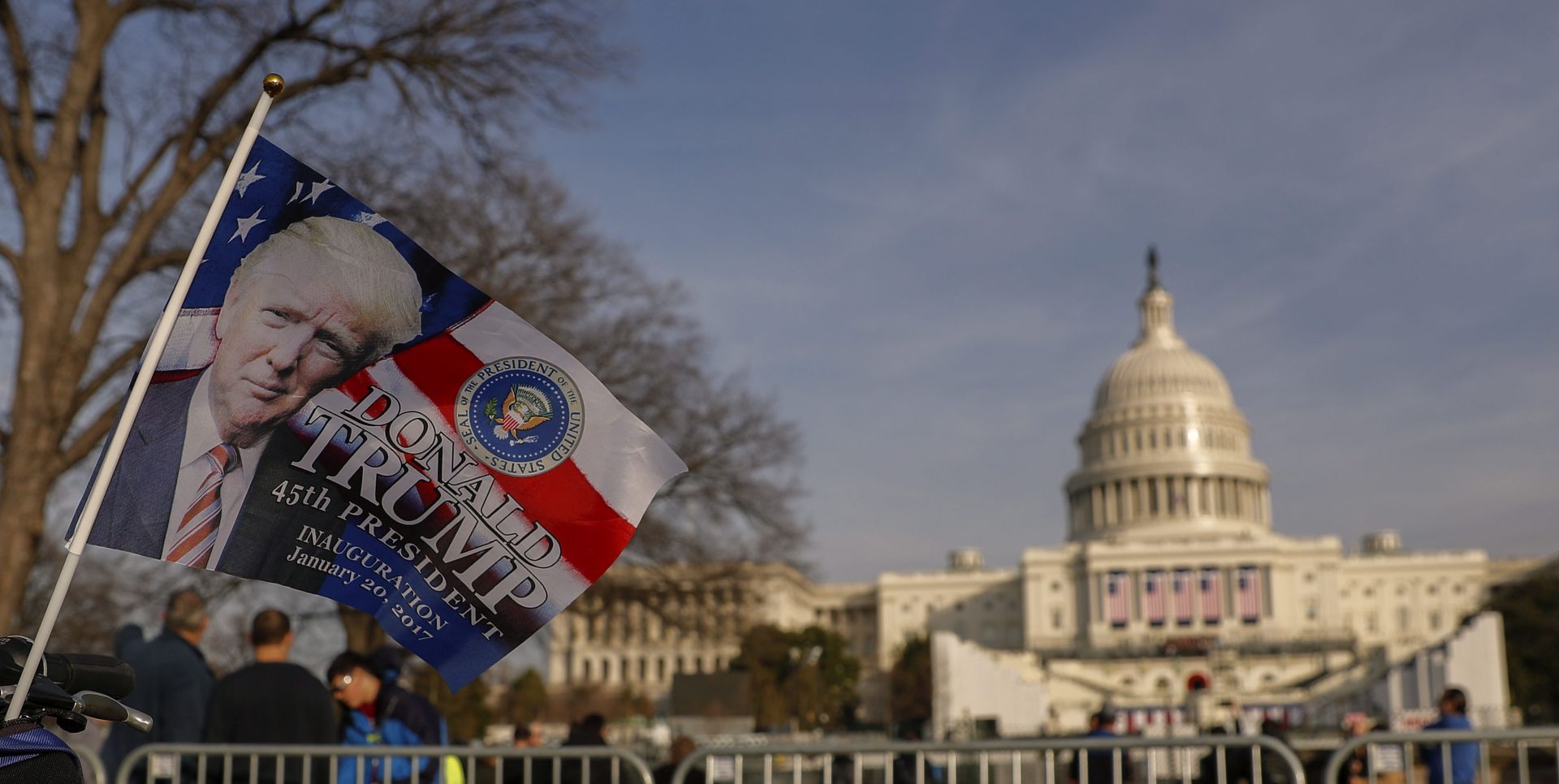 epa05732478 A supporter's flag outside the US Capitol on the eve of President-elect Donald J. Trump's inauguration as the 45th President of the United States in Washington, DC, USA, 19 January 2017. Trump won the 08 November 2016 election to become the next US President.  EPA/ERIK S. LESSER