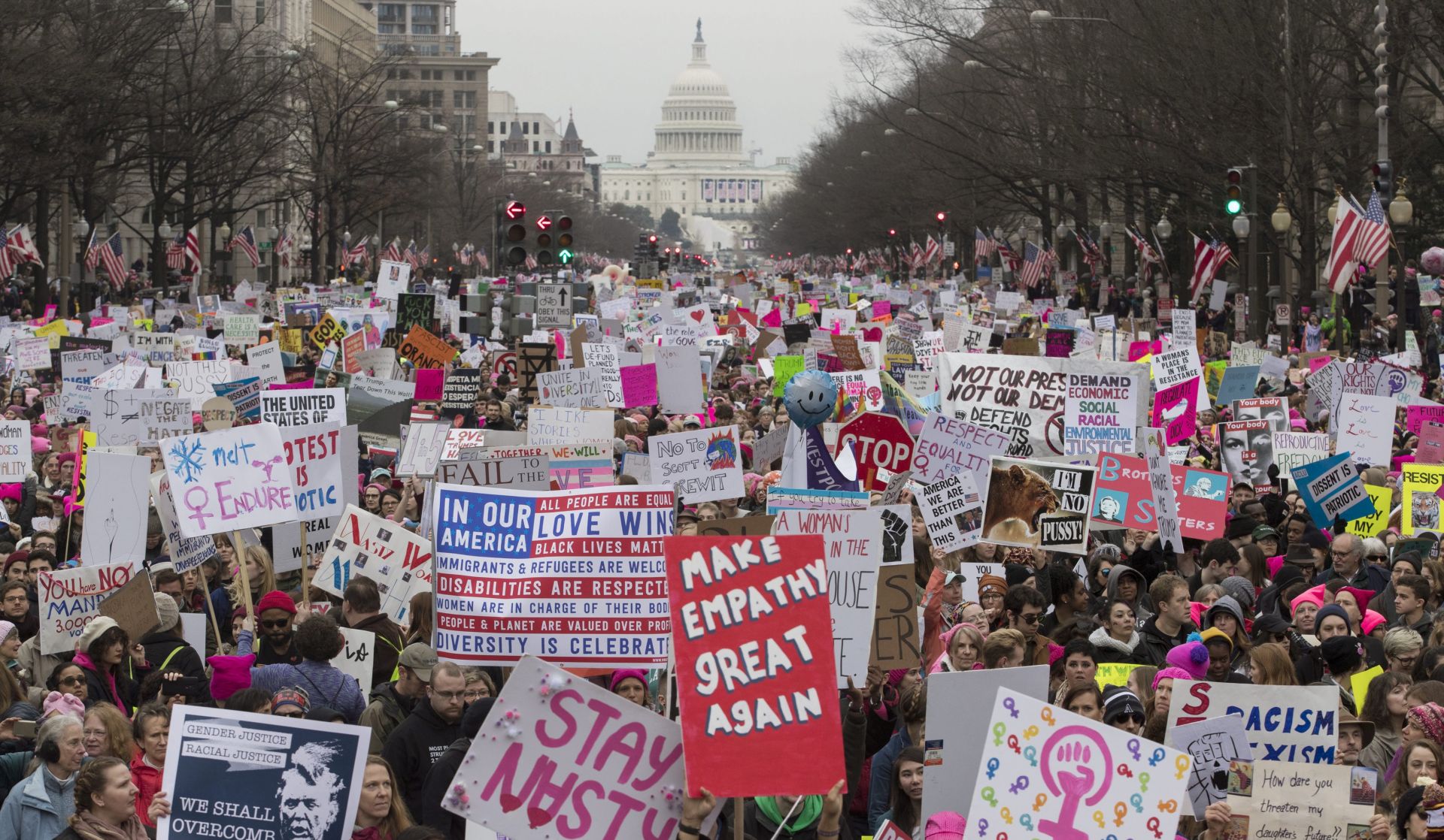 epa05740105 Thousands of people on Pennsylvania Avenue participate in the Women's March and rally to protest President Donald J. Trump the day after he was sworn in as the 45th President of the United States, in Washington, DC, USA, 21 January 2017. Protest rallies were held in over 30 countries around the world in solidarity with the Women's March on Washington in defense of press freedom, women's and human rights following the official inauguration on 20 January of Donald J. Trump as the 45th President of the United States of America in Washington, USA.  EPA/MICHAEL REYNOLDS