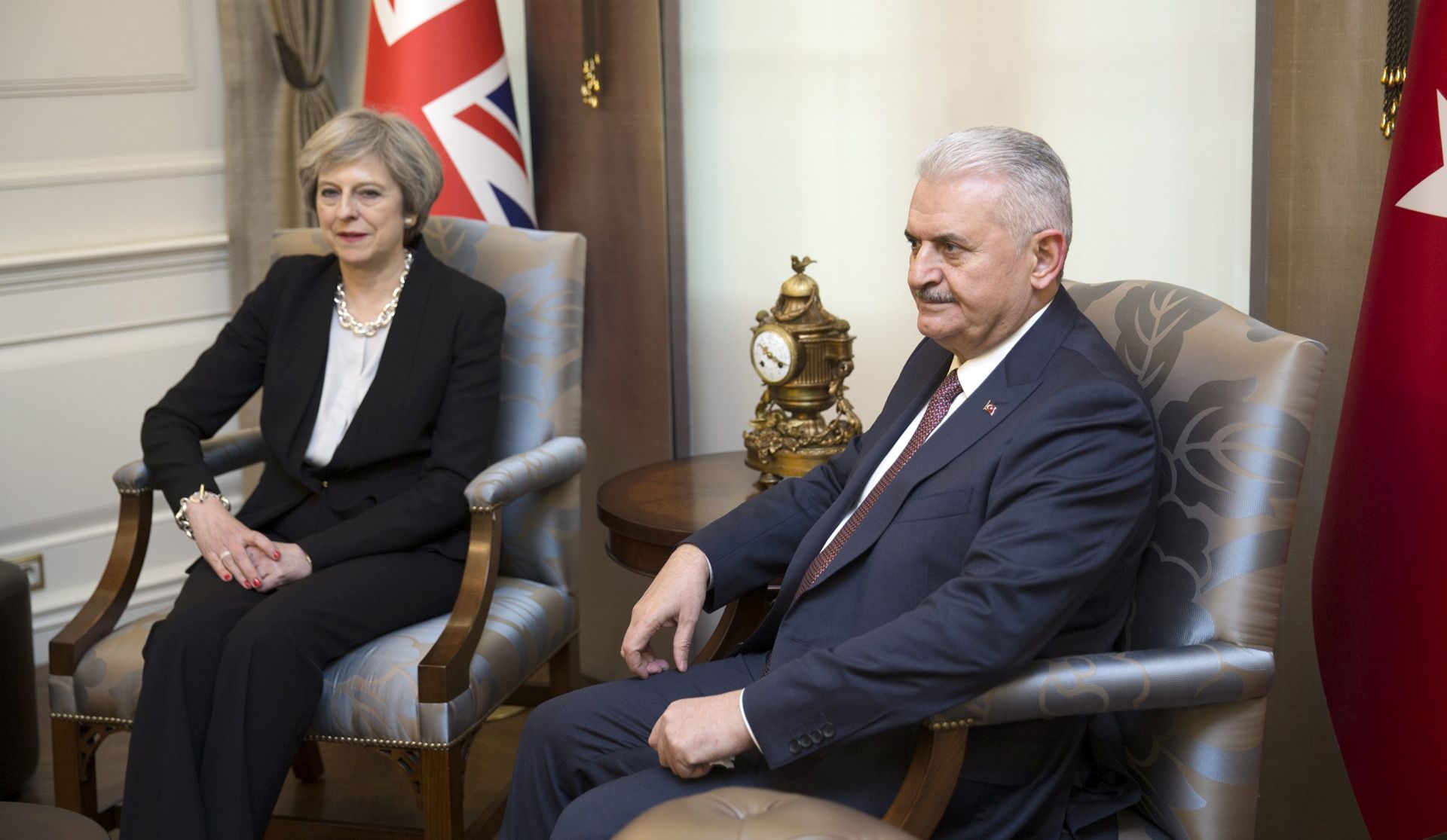 epa05757088 A handout photo made available by Turkish Prime Minister Press office shows British Prime Minister Theresa May (L) meeting with Turkish Prime Minister Binali Yildirim (R) in Ankara, Turkey, 28 January 2017. The British Prime Minister met on 28 January with Turkish leaders to discuss trade issues, the fight against Jihadism and Cyprus' reunification process.  EPA/TURKISH PRIME MINISTER PRESS OFFICE HANDOUT  HANDOUT EDITORIAL USE ONLY/NO SALES