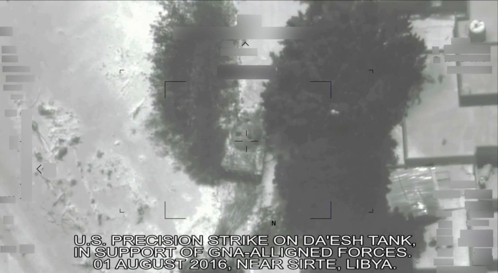 epa05457544 A framegrab taken from a handout video made available by the US Department of Defense (DoD) on 06 August 2016 shows the US military conducting precision air strikes, at the request of the Libyan Government of National Accord (GNA), against the so-called Islamic State (ISIS, ISIL or IS) targets in Sirte, Libya, 01 August 2016, to support GNA-affiliated forces seeking to defeat the jihadist militant group in its primary stronghold in the country. In frame is visible the first strike which successfully disabled a T-72 tank (C).  EPA/USA DEPARTMENT OF DEFENSE -- BEST QUALITY AVAILABLE -- HANDOUT EDITORIAL USE ONLY