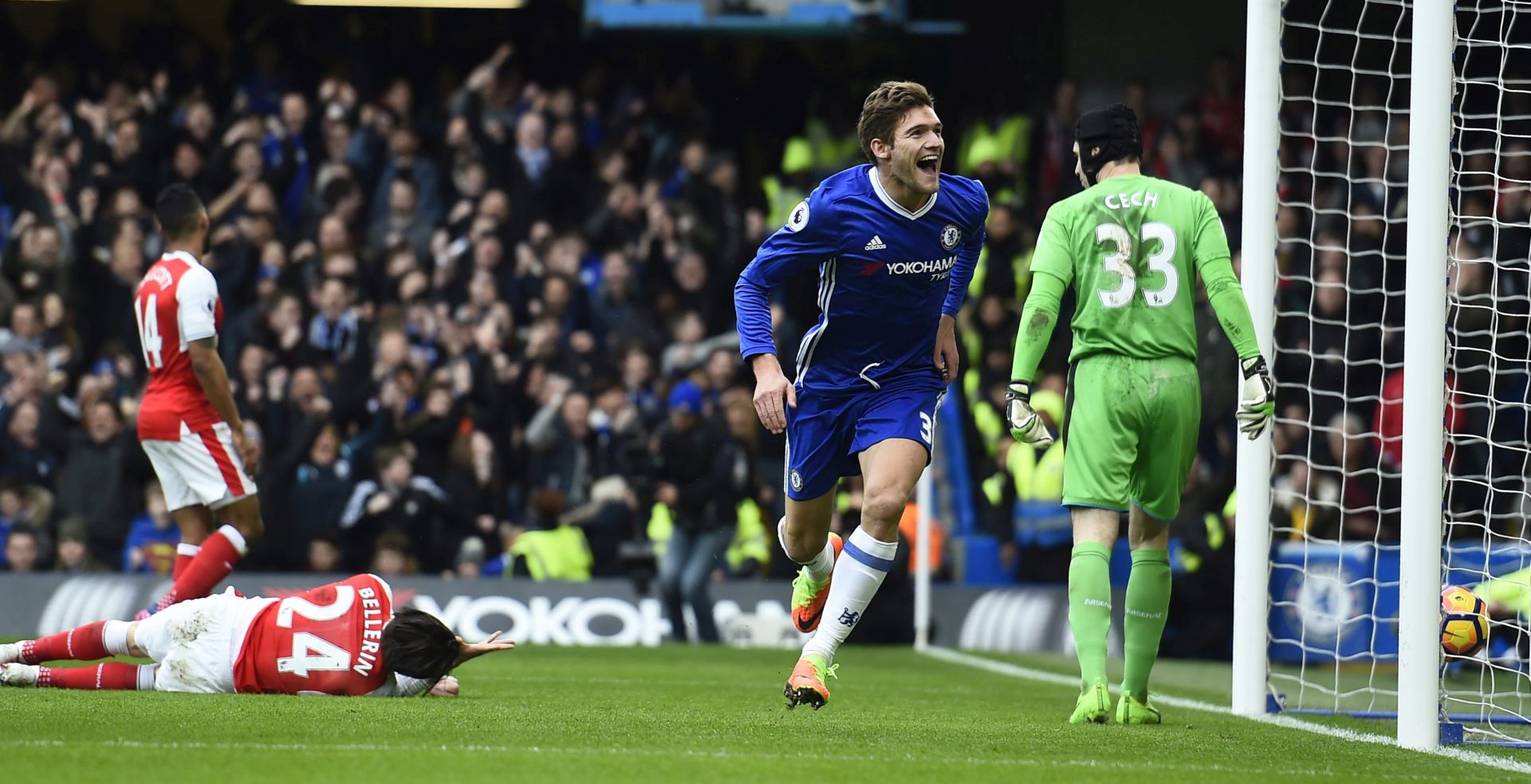 epa05770333 Chelsea's Marcos Alonso celebrates after scoring against Arsenal during their English Premier League soccer match at Stamford Bridge, London, Britain, 4 February 2017.  EPA/WILL OLIVER EDITORIAL USE ONLY. No use with unauthorized audio, video, data, fixture lists, club/league logos or 'live' services. Online in-match use limited to 75 images, no video emulation. No use in betting, games or single club/league/player publications.