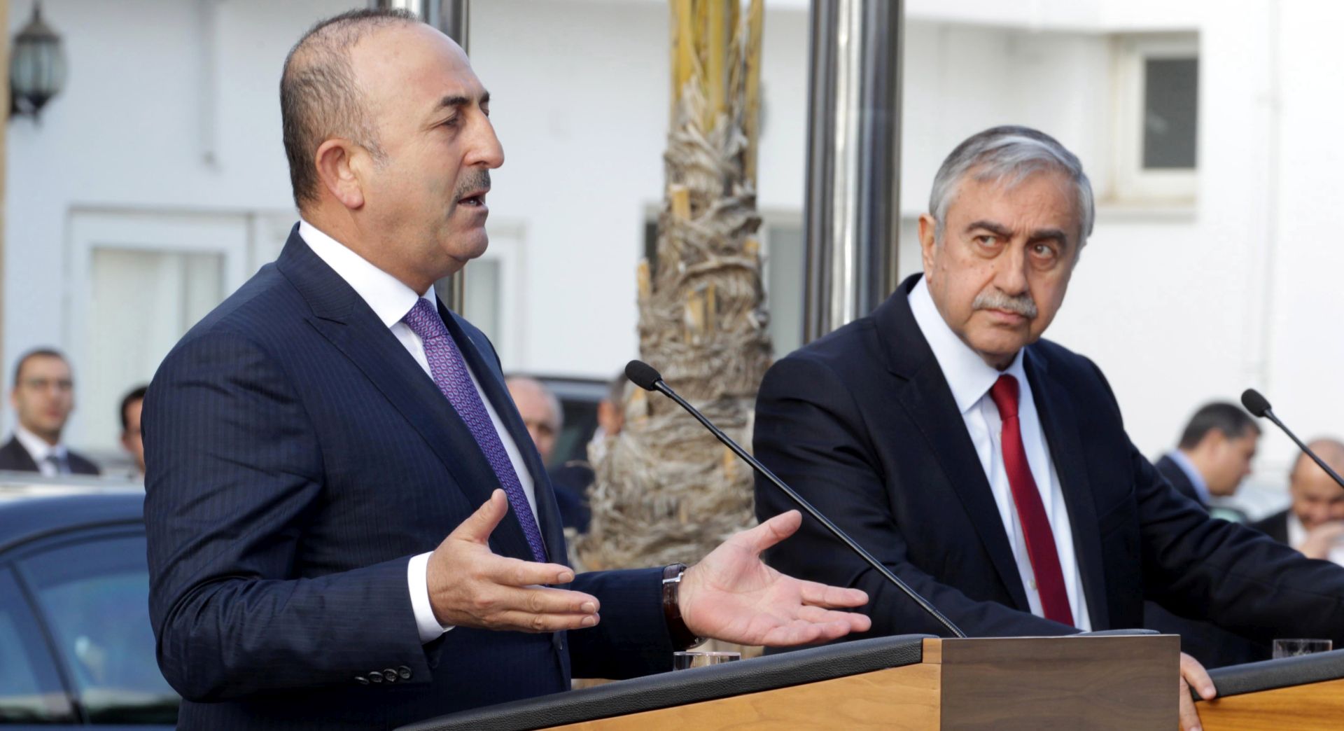 epa05807161 Turkish Foreign Minister Mevlut Cavusoglu (L) with the Turkish Cypriot leader Mustafa Akinci (R) give a press conference in Turkish occupied Nicosia, Cyprus, 21 February 2017.  EPA/STR