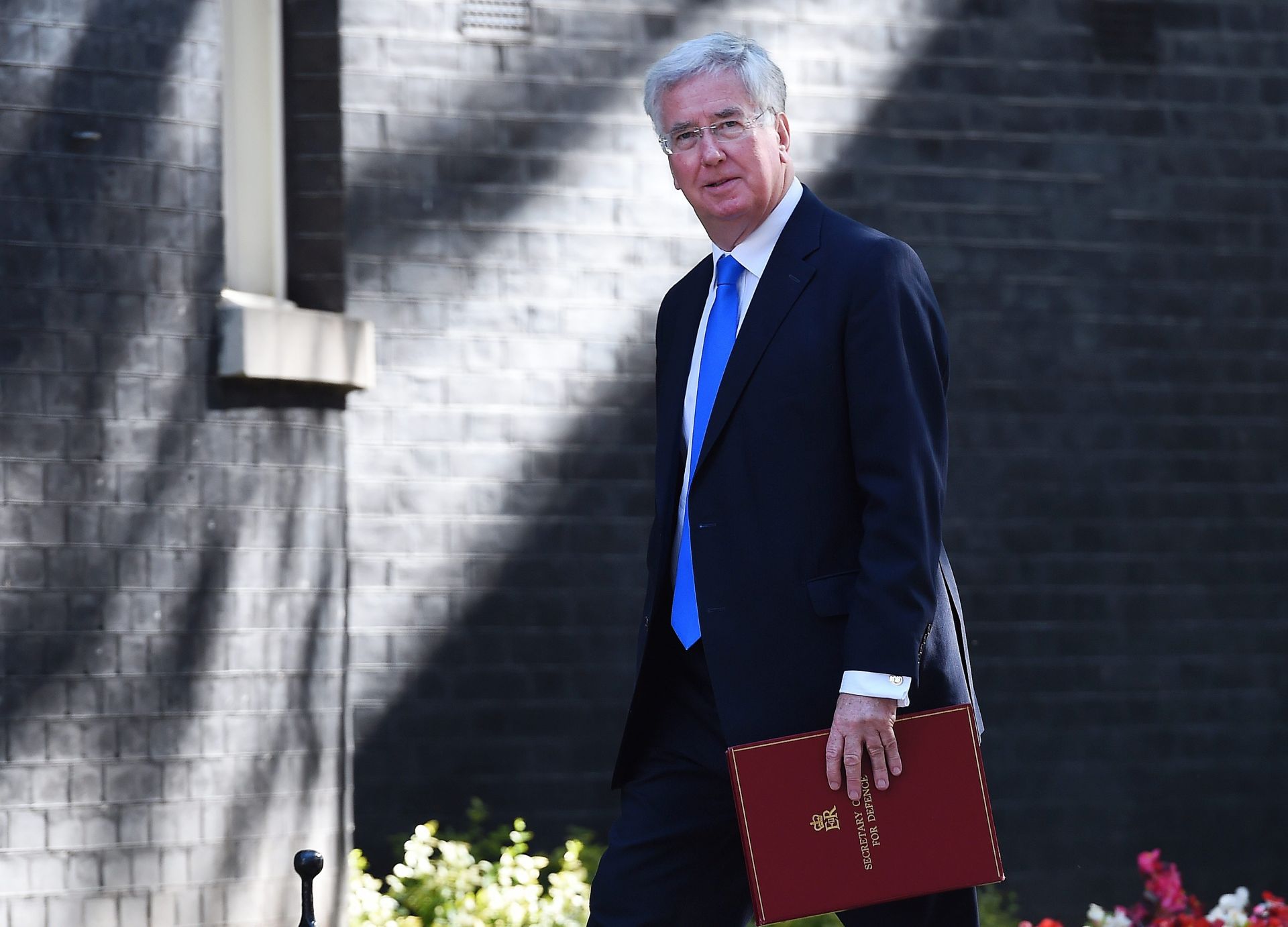epa05431595 British Secretary of State for Defence Michael Fallon arrives for a cabinet meeting at number 10 Downing Street in London, 19 July 2016. British Prime Minister Theresa May held her first cabinet meeting 19 July 2016.  EPA/ANDY RAIN