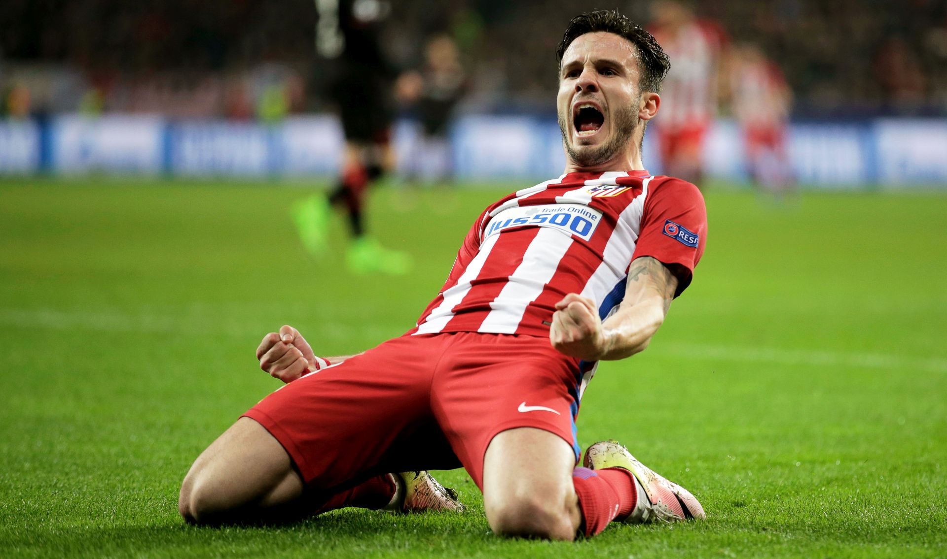 epa05807385 Atletico Madrid's Saul Niguez celebrates after scoring the 1-0 lead during the UEFA Champions League Round of 16, first leg soccer match between Bayer Leverkusen and Atletico Madrid in Leverkusen, Germany, 21 February 2017.  EPA/FRIEDEMANN VOGEL
