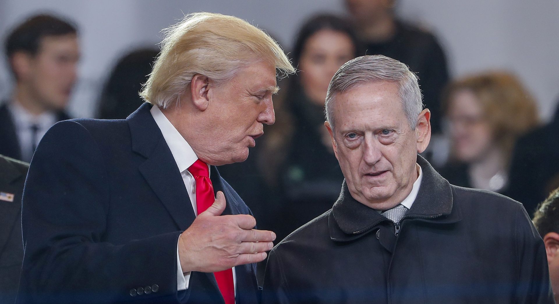 epa05736779 US President Donald J. Trump (L) greets new Secretary of Defense James 'Mad Dog' Mattis (R) in the reviewing stand during the Inaugural Parade after Trump took the oath of office as the 45th President of the United States in Washington, DC, USA, 20 January 2017. Trump won the 08 November 2016 election to become the next US President.  EPA/ERIK S. LESSER