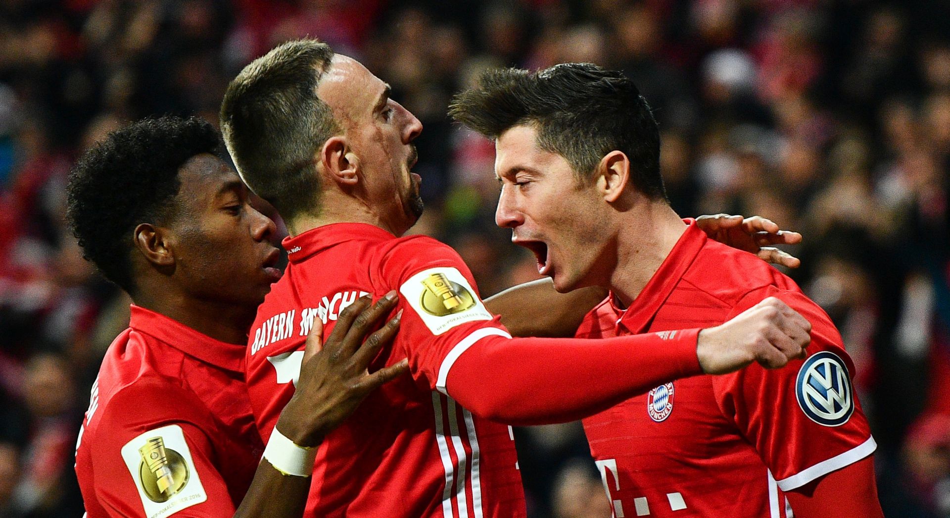 epa05823588 Bayern's Robert Lewandowski (R), Franck Ribery (C) and David Alaba celebrate the first goal during the German DFB Cup quarter final soccer match between FC Bayern Munich and FC Schalke 04 in Munich, Germany, 01 March 2017.

(ATTENTION: The DFB prohibits the utilisation and publication of sequential pictures on the internet and other online media during the match (including half-time). ATTENTION: BLOCKING PERIOD! The DFB permits the further utilisation and publication of the pictures for mobile services (especially MMS) and for DVB-H and DMB only after the end of the match.)  EPA/CHRISTIAN BRUNA