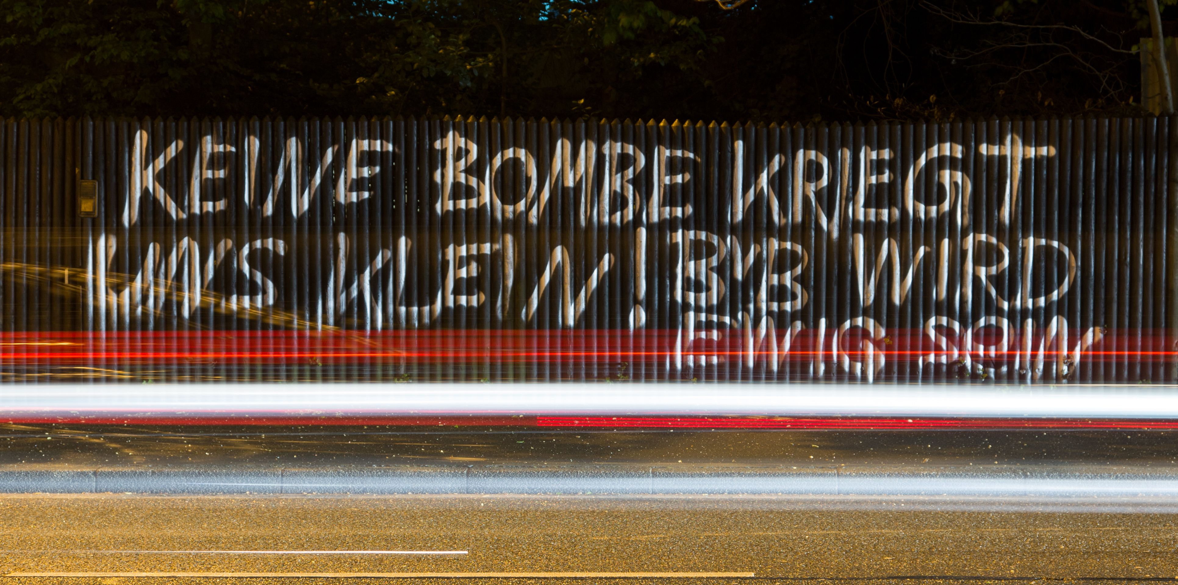 'Keine Bombe kriegt uns klein! BVB wird ewig sein' (lit. 'No bomb will bring us down! BVB lasts forever') is written on a fence in Dortmund, Germany, 12 April 2017. Three explosive devices detonated next to the team bus of the Borussia Dortmund soccer team in the evening of 11 April. The Champions League match in Dortmund was cancelled after the explosive attack involving two injured. Photo: Friso Gentsch/dpa